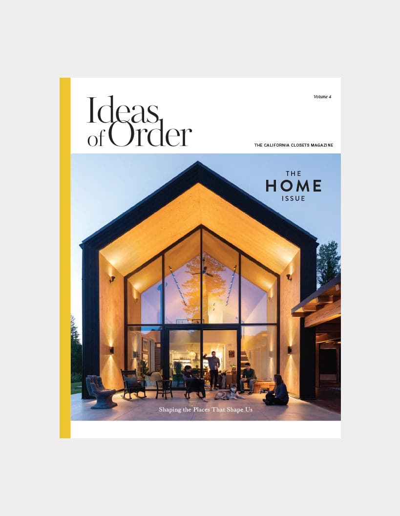 Cover of "Ideas of Order" magazine, Volume 4, titled "The Home Issue", showing a modern home with glass windows and warm lighting, with people inside