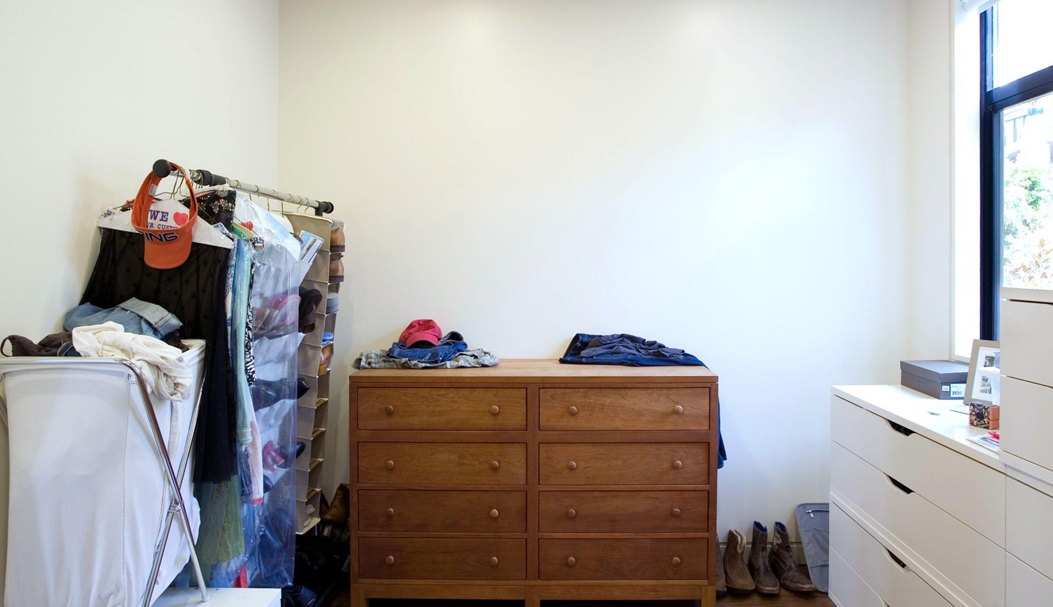 Client's room chosen to redesign to a custom walk in closet by California Closets