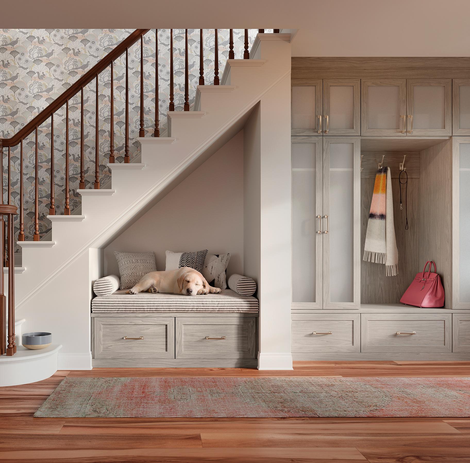 Custom mudroom entryway understairs design with bench storage seat and drawers by California Closets