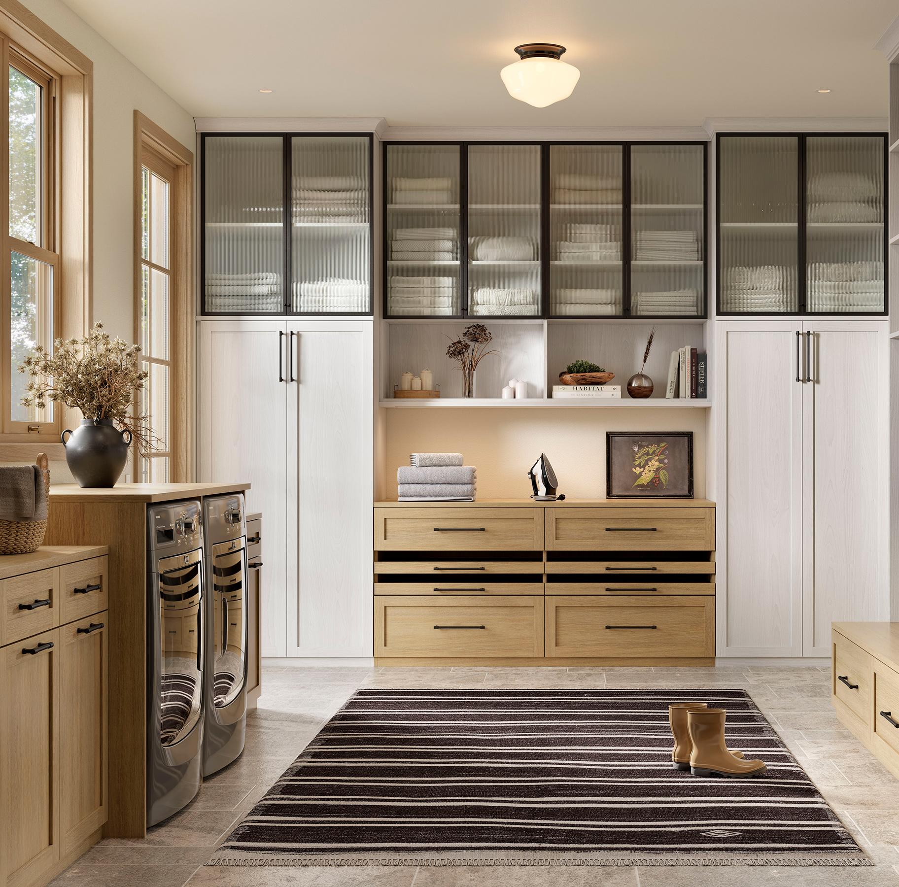 Custom designed multipurpose laundry room and mudroom with cabinets by California Closets