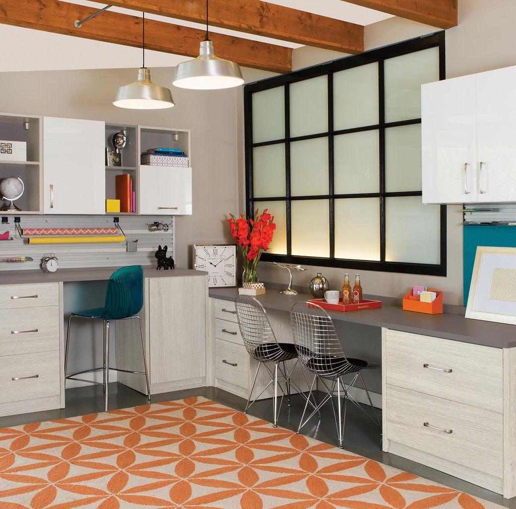 Craft room designed with multiple workspaces, supply organization by California Closets