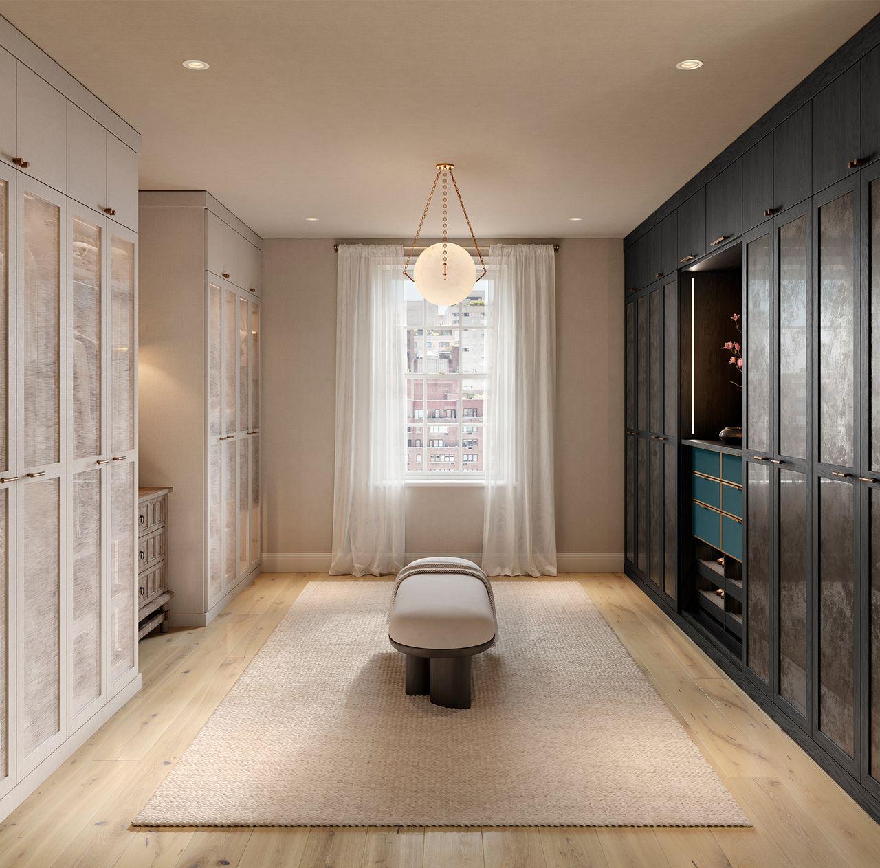 Floor to ceiling custom cabinets in light and dark finishes his and hers design by California Closets