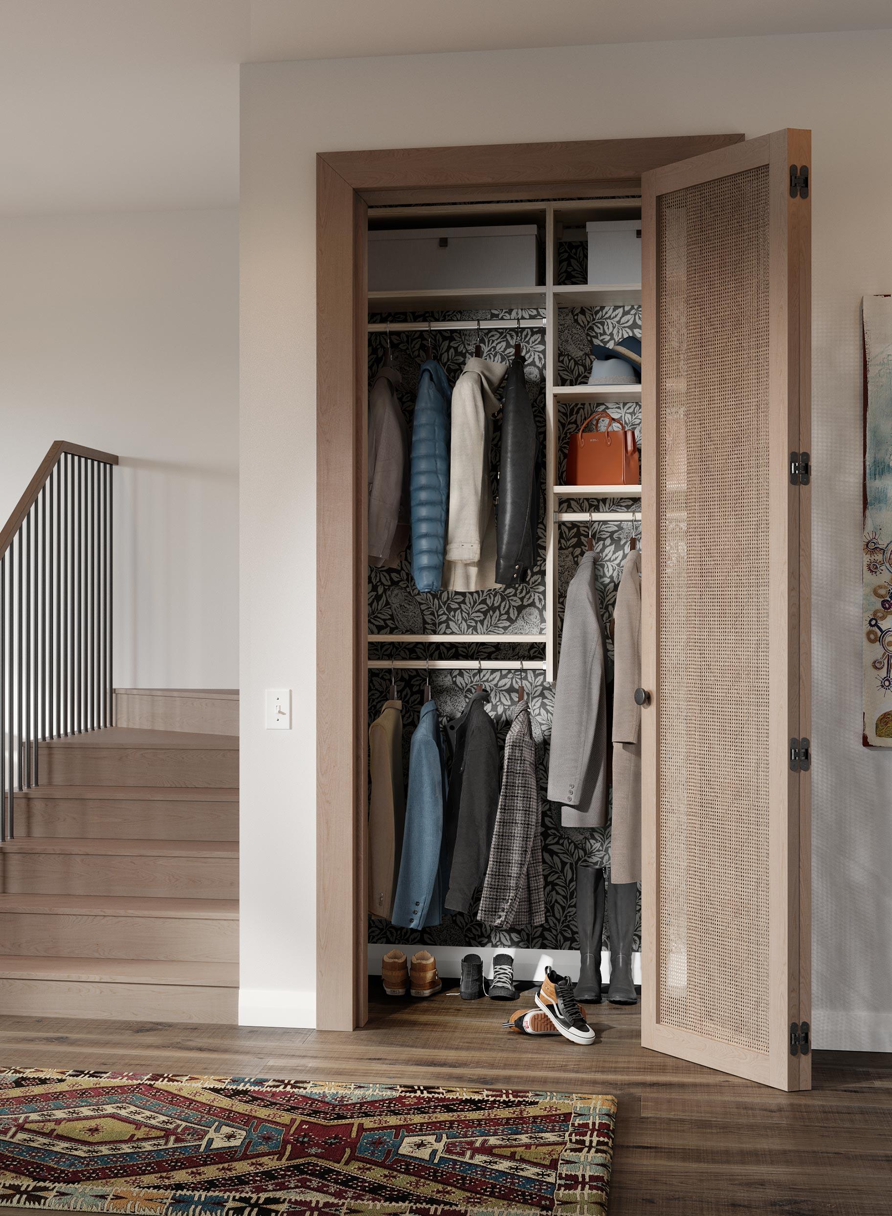 Entryway hall closet for coats and jackets by California Closets