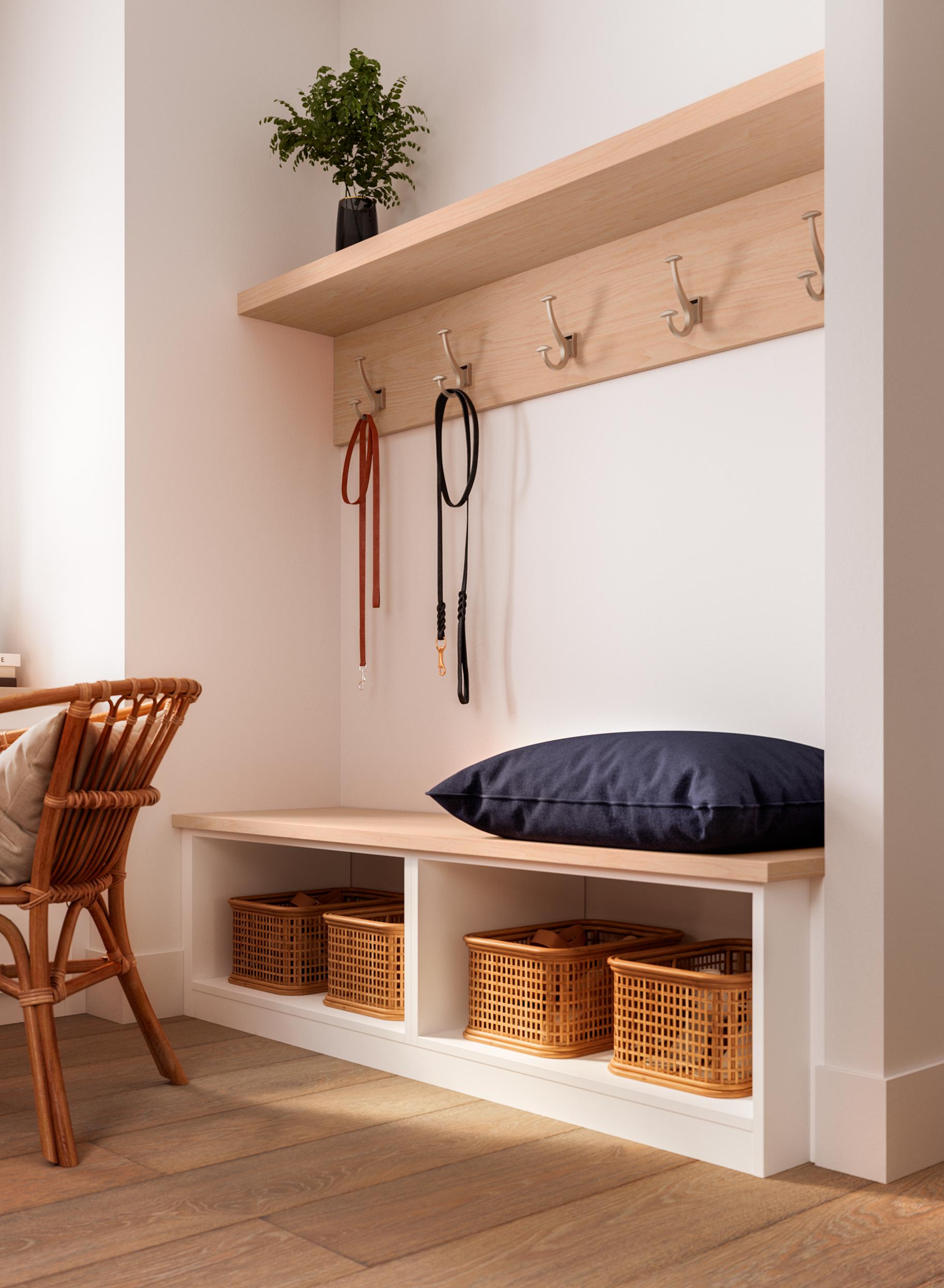 Mudroom designed with a long bench and cubbie storage beneath from California Closets