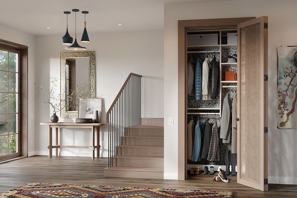 Hallway closet design with custom storage shelves in small built in layout designed by closet world California Closets. Activate to enhance image.