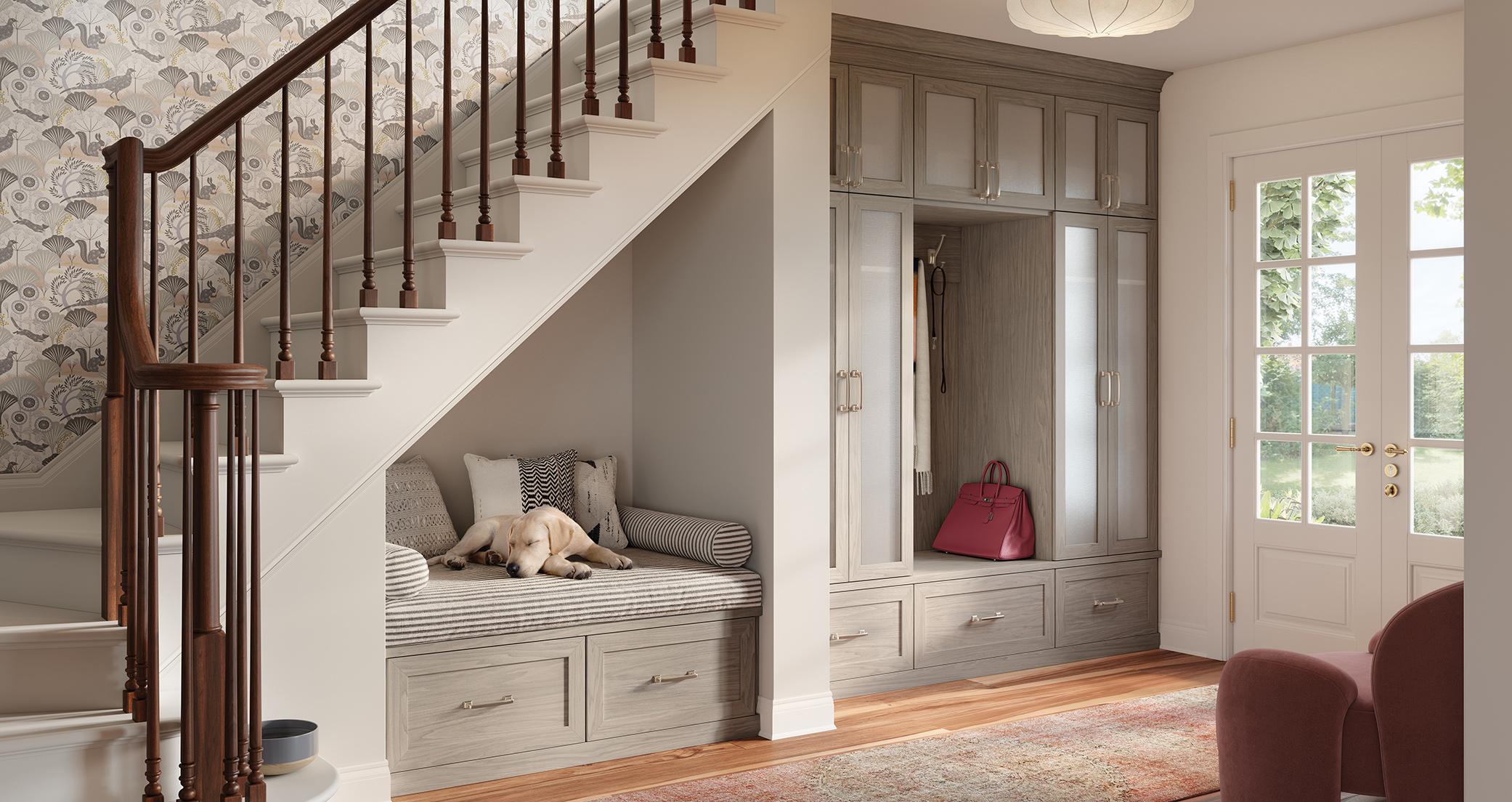 Entrway design with mudroom features, bench for pets or changing and custom cabinets created by California Closets