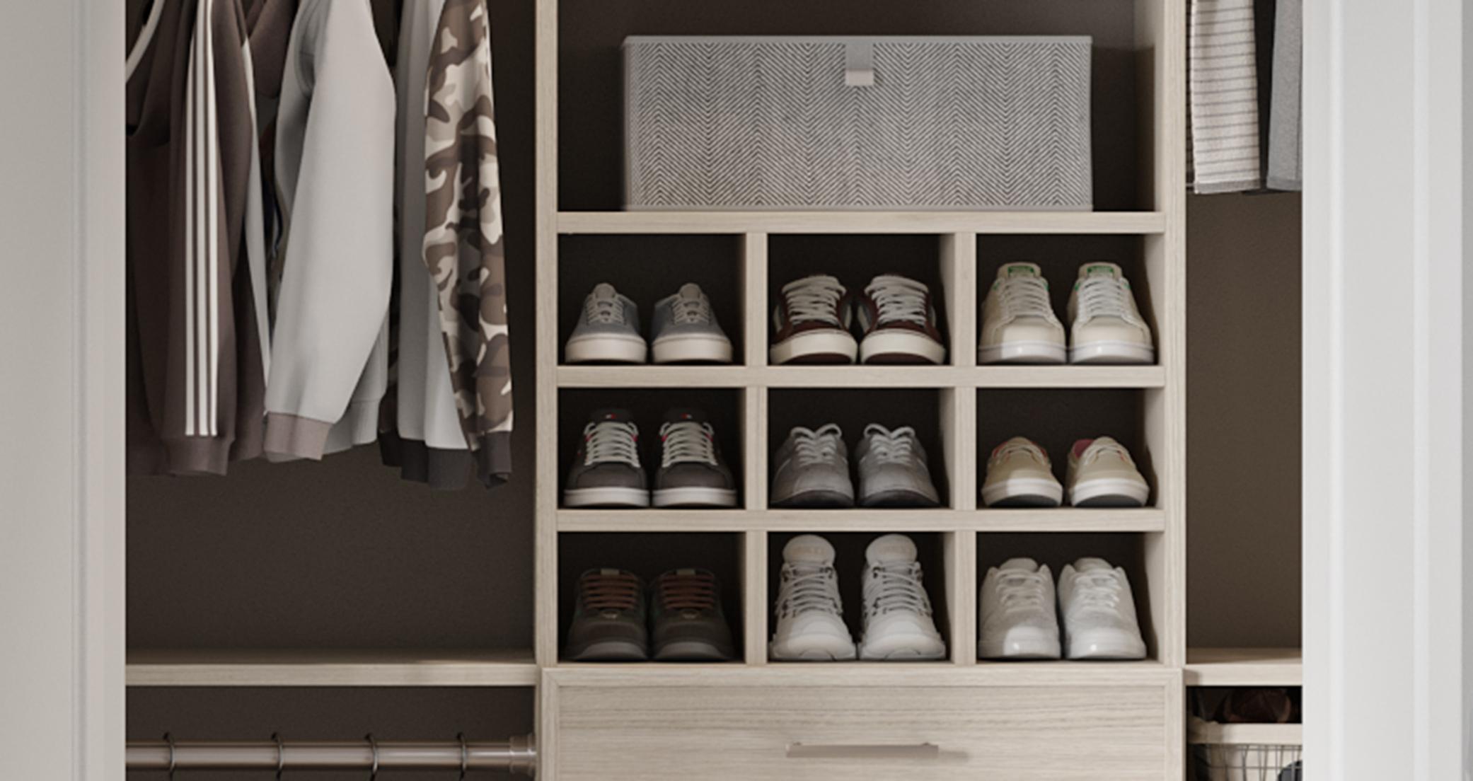 Custom shoe cubbies centered in closet in light wood grain finish by California Closets