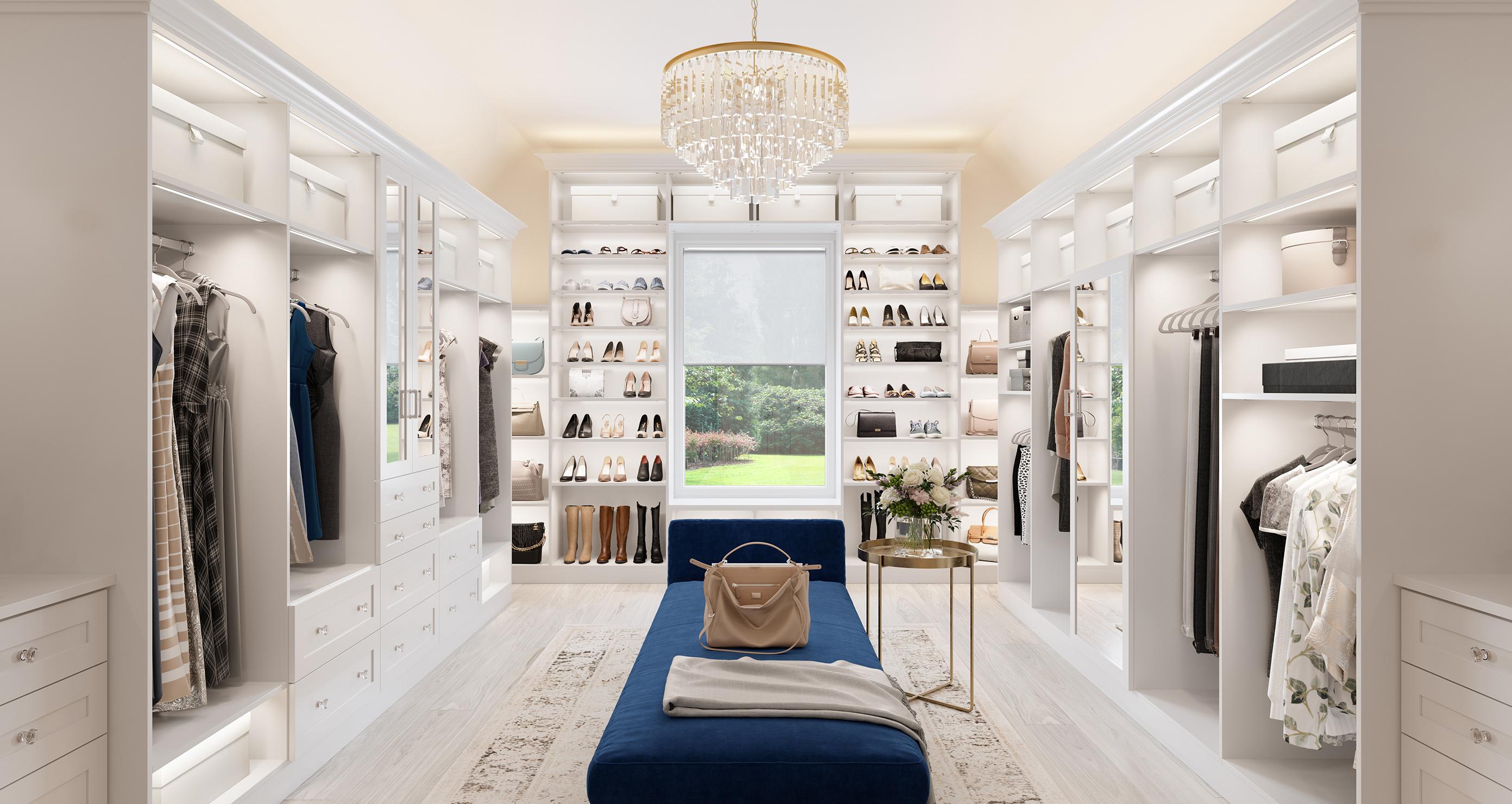 Luxe walk in closet with shoe storage, custom cabinets and open shelving by California Closets