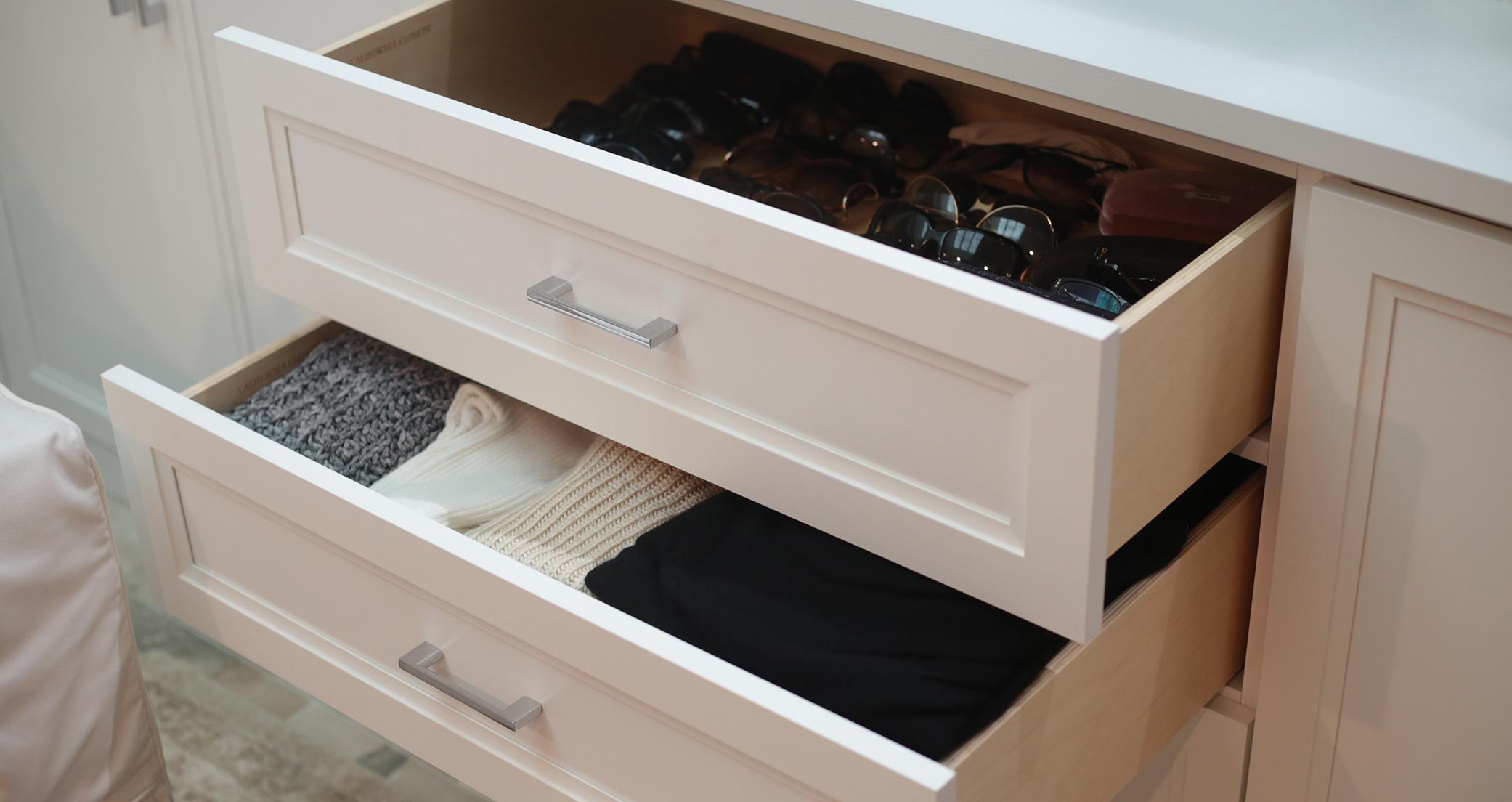 Charissa Thompson's wardrobe storage gets a refresh with custom cabinets in a light wood grain finish by California Closets