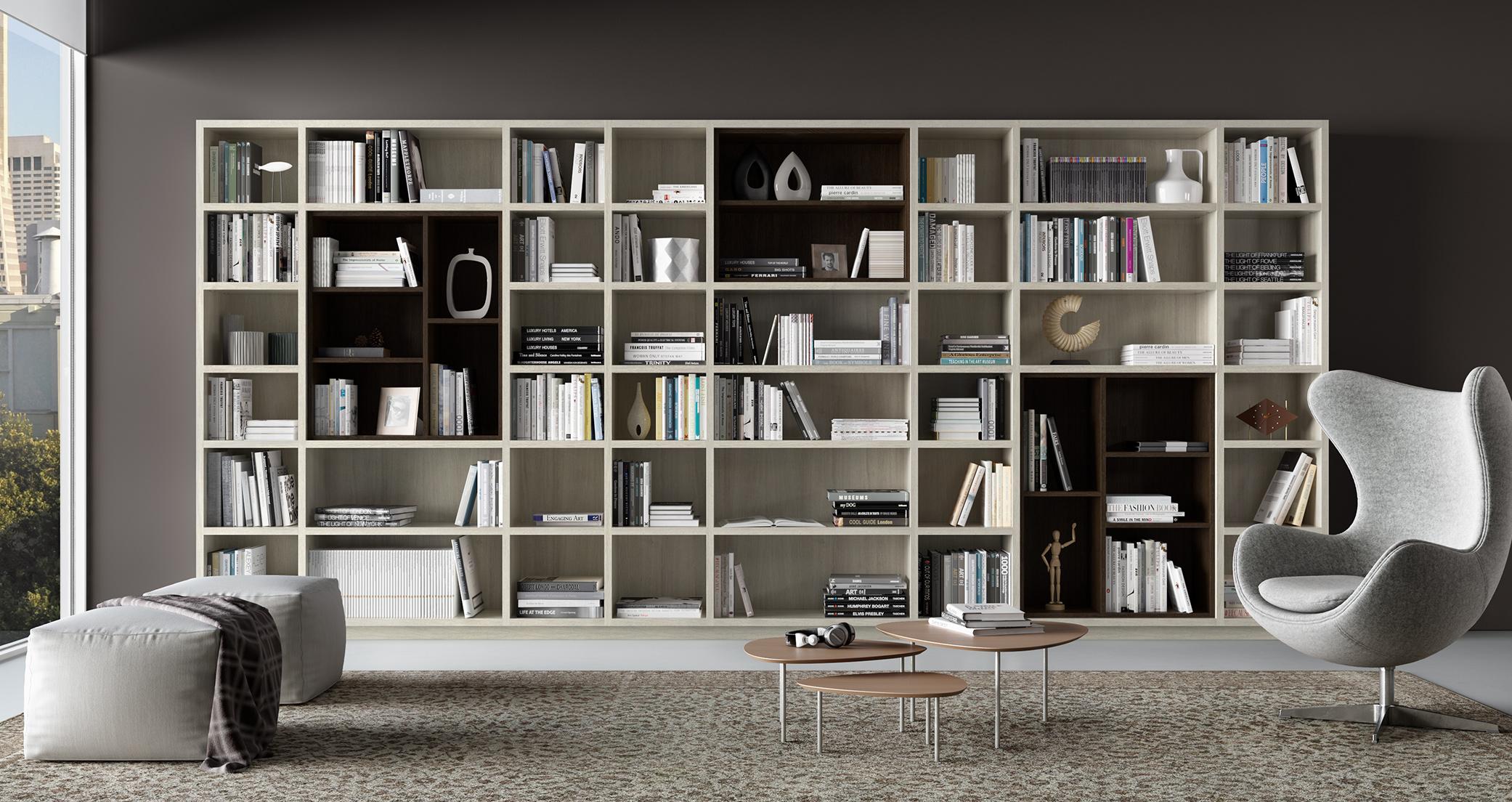 Bibliotecas de California Closets diseñadas con un toque moderno y acabado en madera veteada blanca de California Closets
