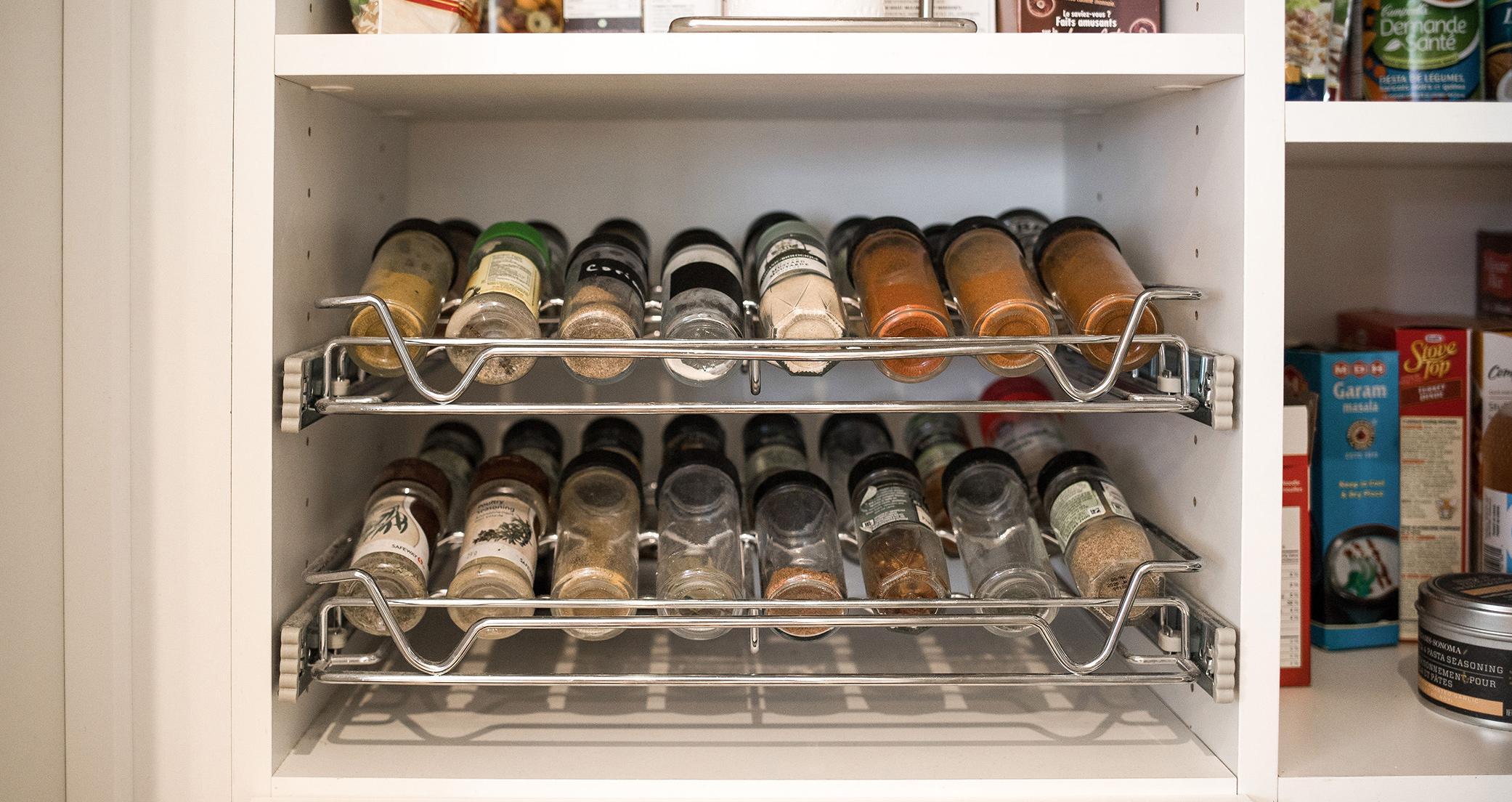 Kitchen wire rack pullout spice drawer storage by California Closets