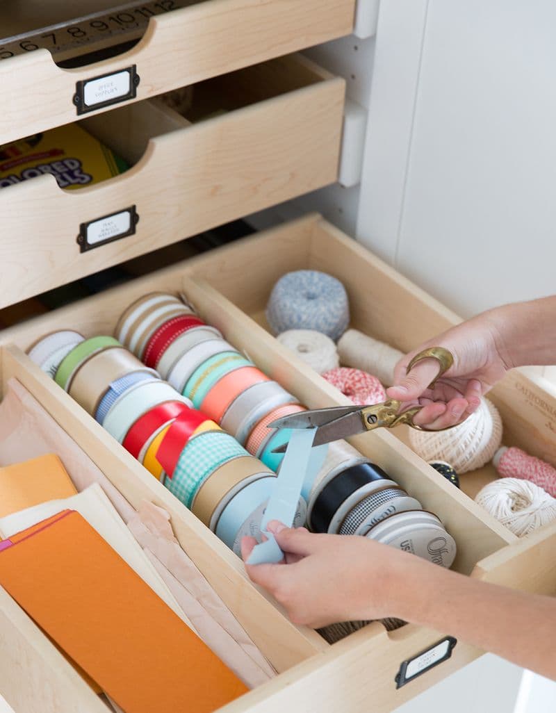 Crafting supply drawer custom built in a craft closet designed by California Closets