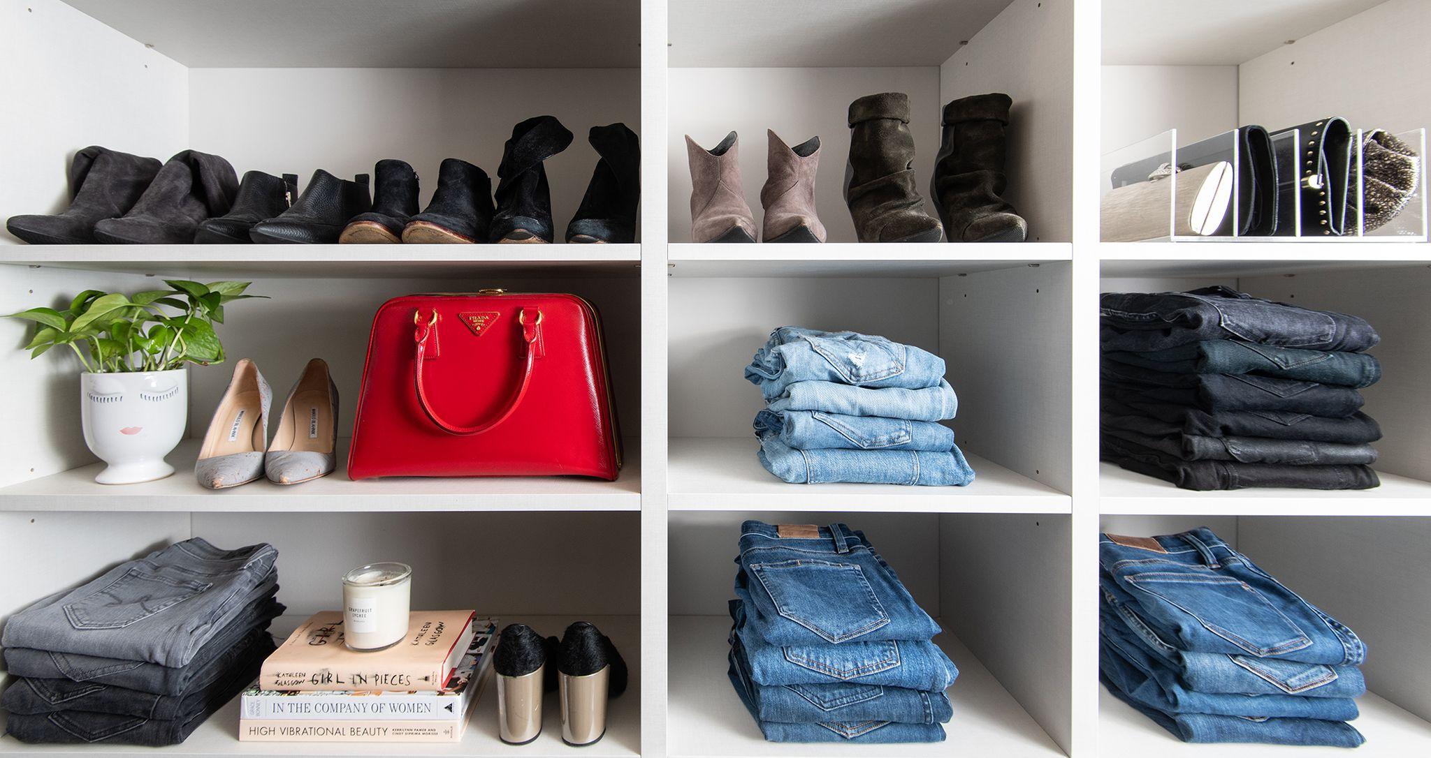 Custom cubbie storage walk in closet for shoes purses and jeans by California Closets