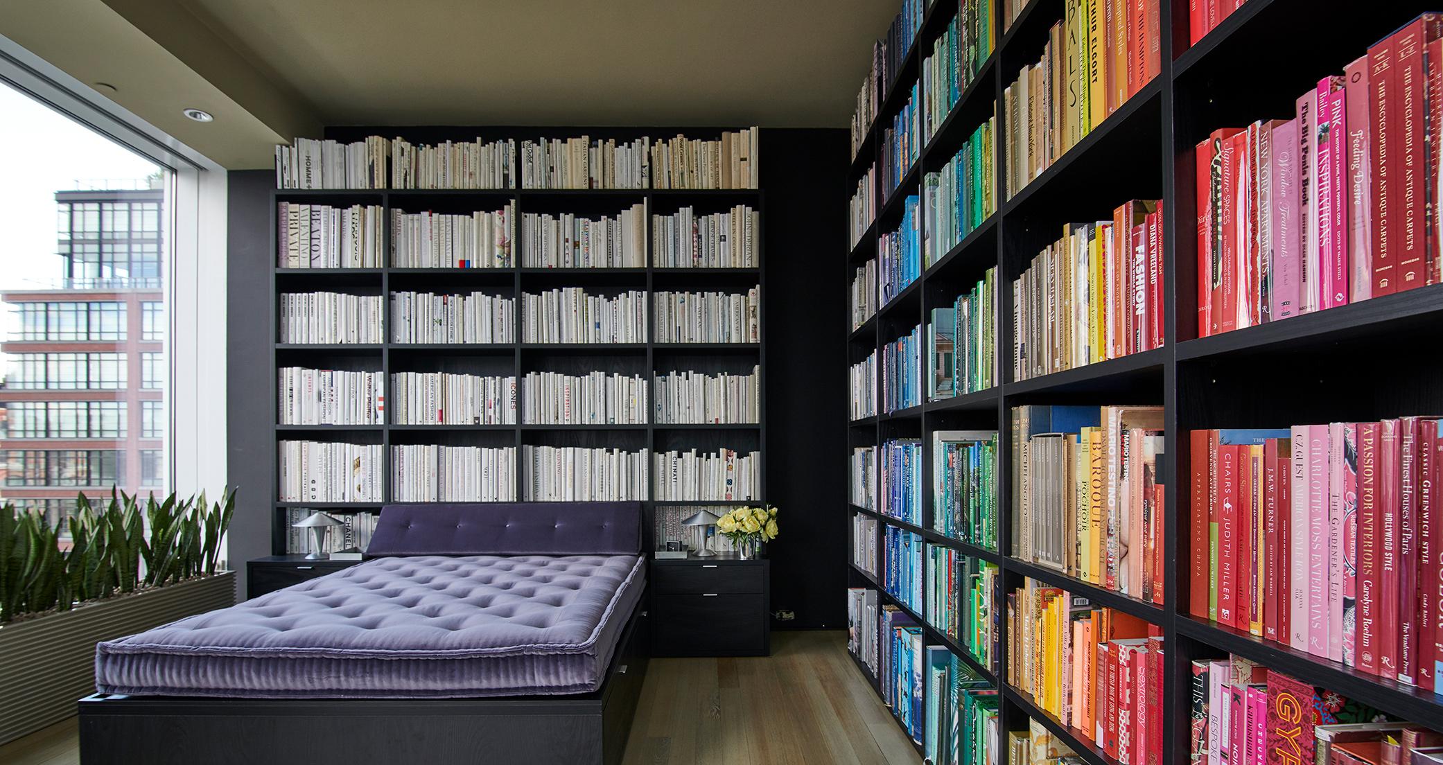 Kevin Sharkey's NYC skyrise condo with custom library bookshelves created by California Closets