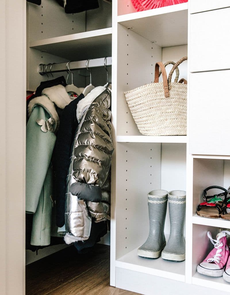 Kids reach in closet shoe storage in classic white finish by California Closets