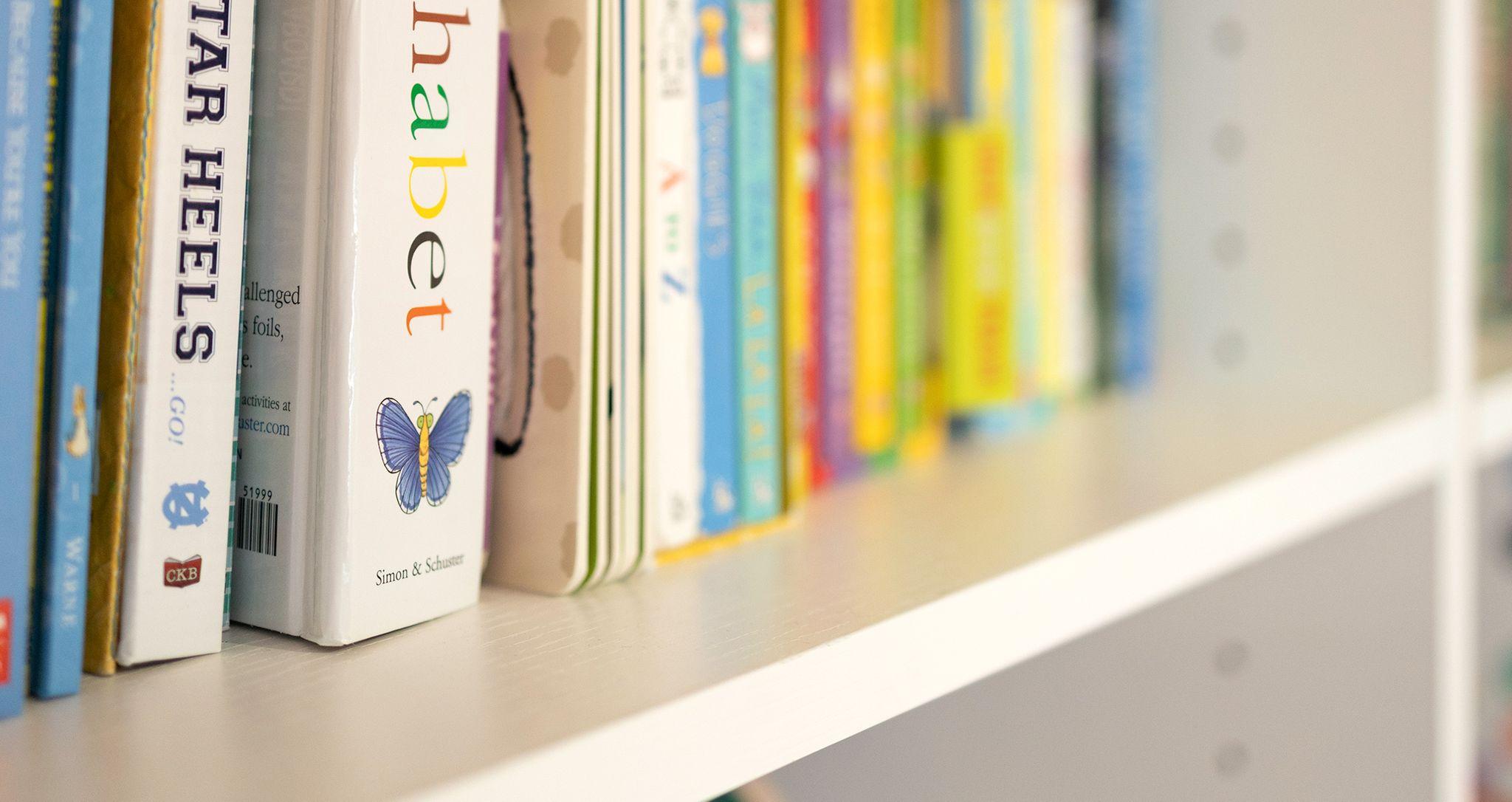 Close up bookcase detail from customized shelving designed by California Closets