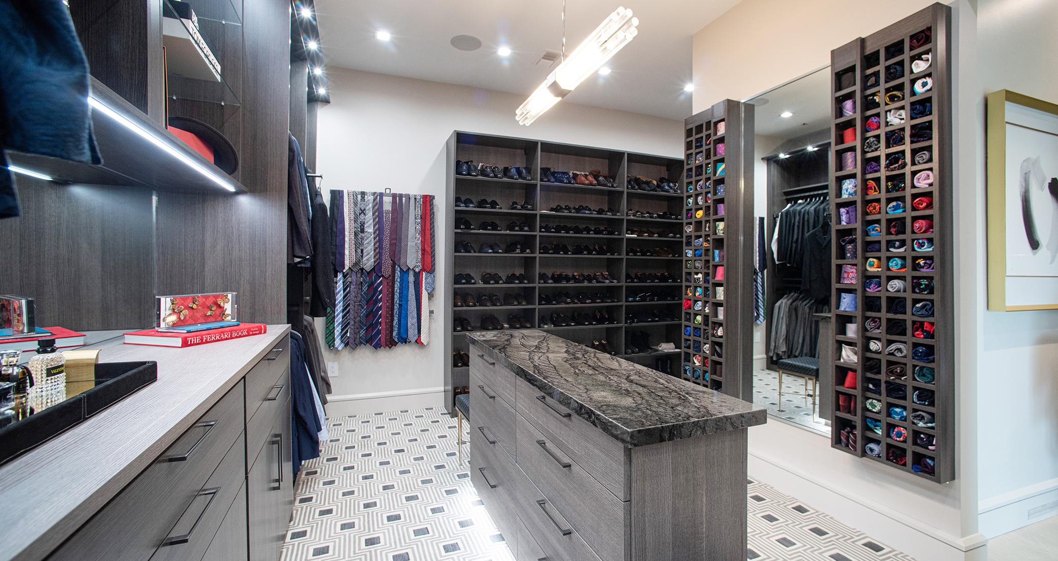 Closet cubbies and shelves for organzation in a walk in closet by California Closets