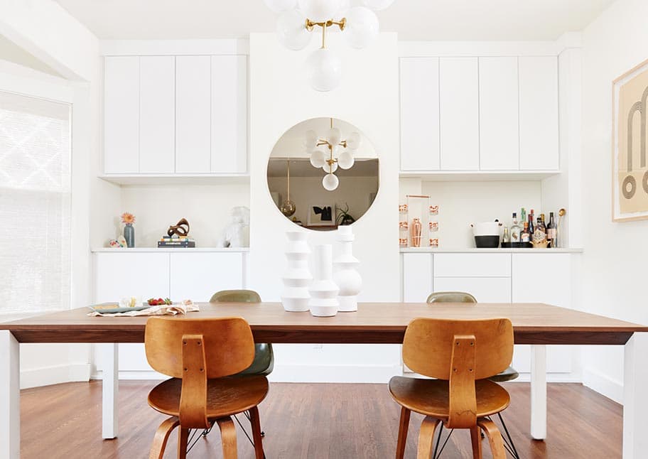 Custom kitchen storage drawers in white wood finish by California Closets