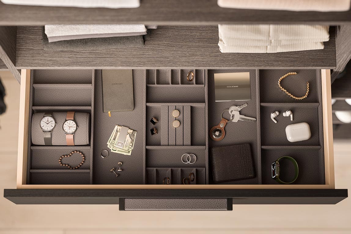 Custom closet drawer designed for your jewelry in a dark wood finish designed by California Closets