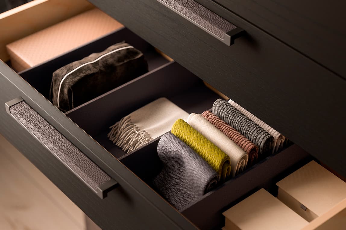Faux leather-wrapped adjustable front-to-back drawer dividers to organize accessories by California Closets