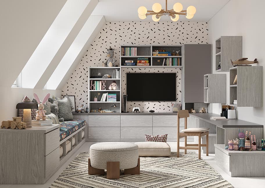 Entertainment center with media in a playroom with custom cabinets by California Closets