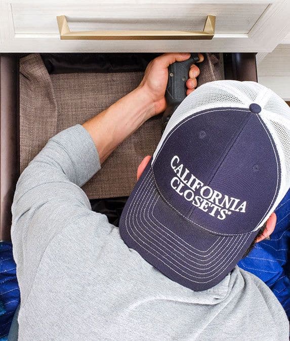 Installation of custom closet professionally designed and created by California Closets