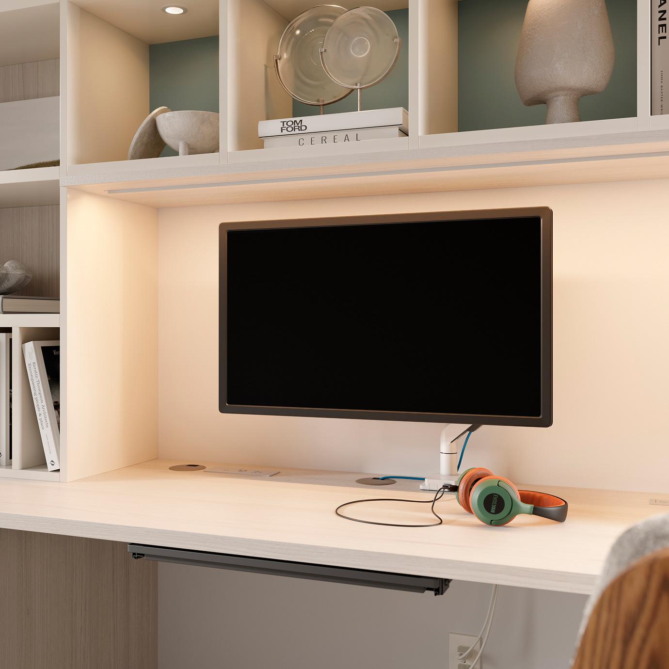 Shielded ribbon LED strip lighting installed under home office desk shelves by California Closets