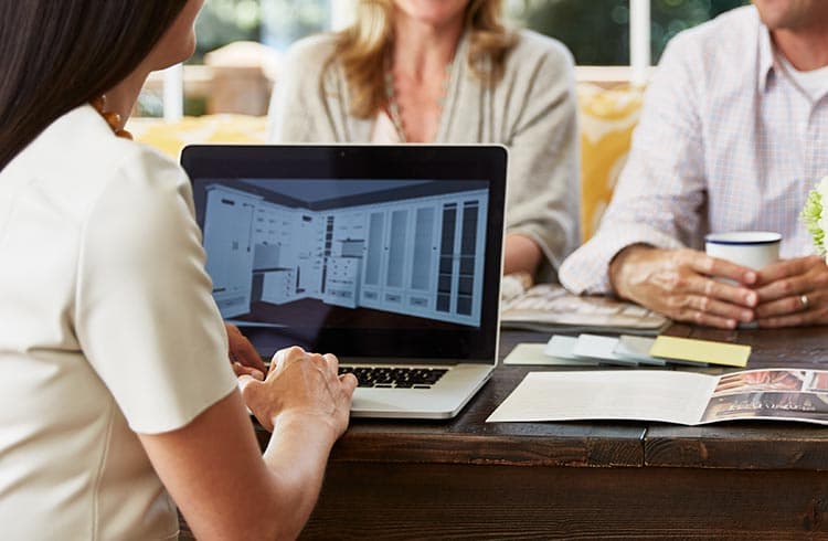 Design consultation session in the showrom with the California Closets designer and customers 