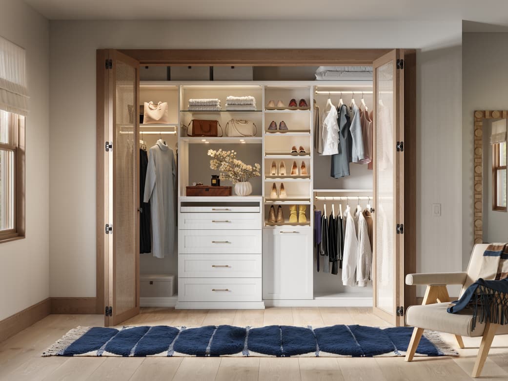 Reach-in closet custom-built dresser and LED lighting by California Closets