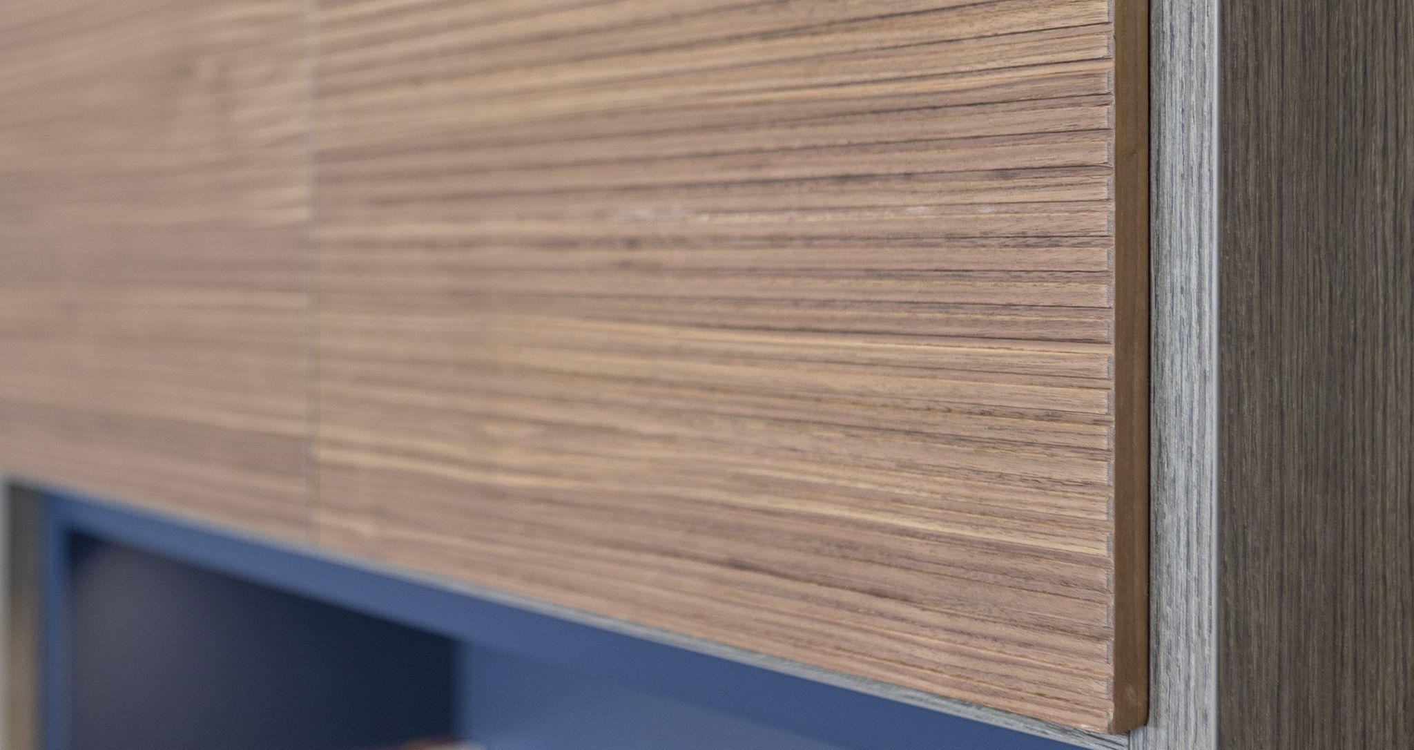 Custom textured media center cabinets by California Closets