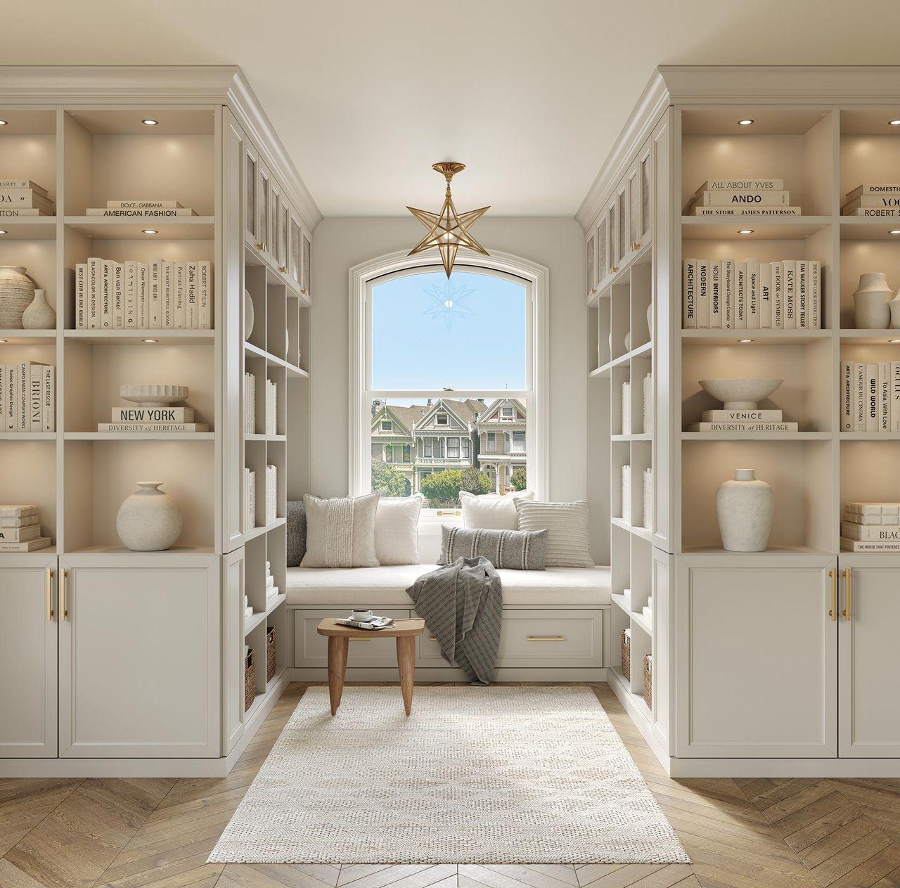 Custom reading nook with library shelves in light matte finish with window bench from California Closets