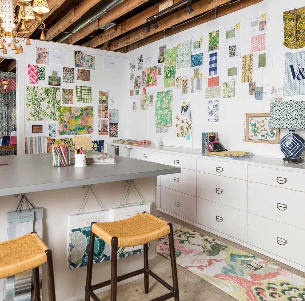 Custom arts and crafts space with dual drawers and island desk space by California Closets