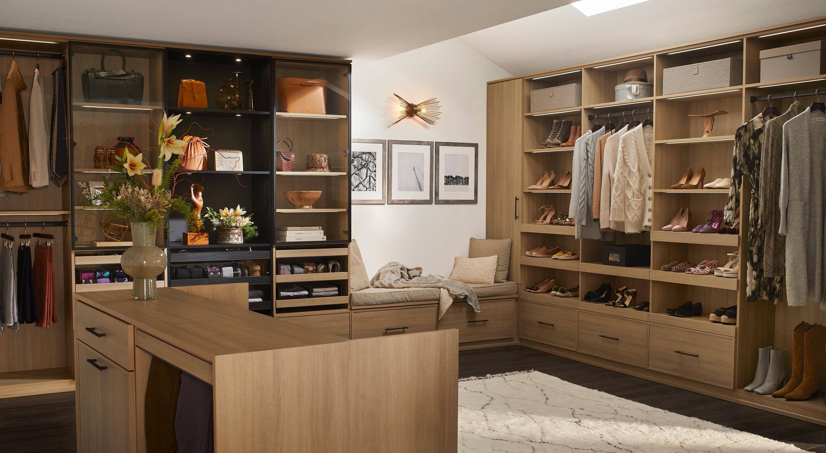 Custom modern walk in closet with island custom made by California Closets