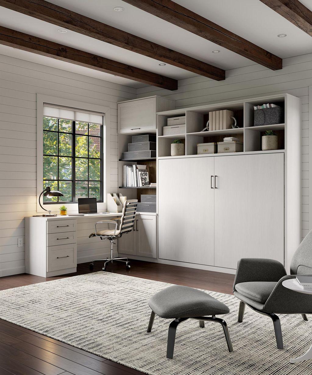 Loft style bedroom with wall bed, built in desk and vertical storage to maximize space by California Closets