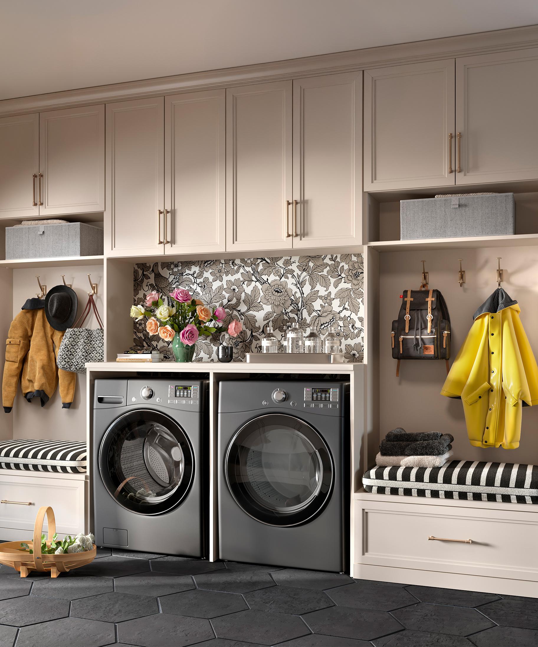 Custom laundry room in entryway with shelving options and custom doors and drawers made by California Closets