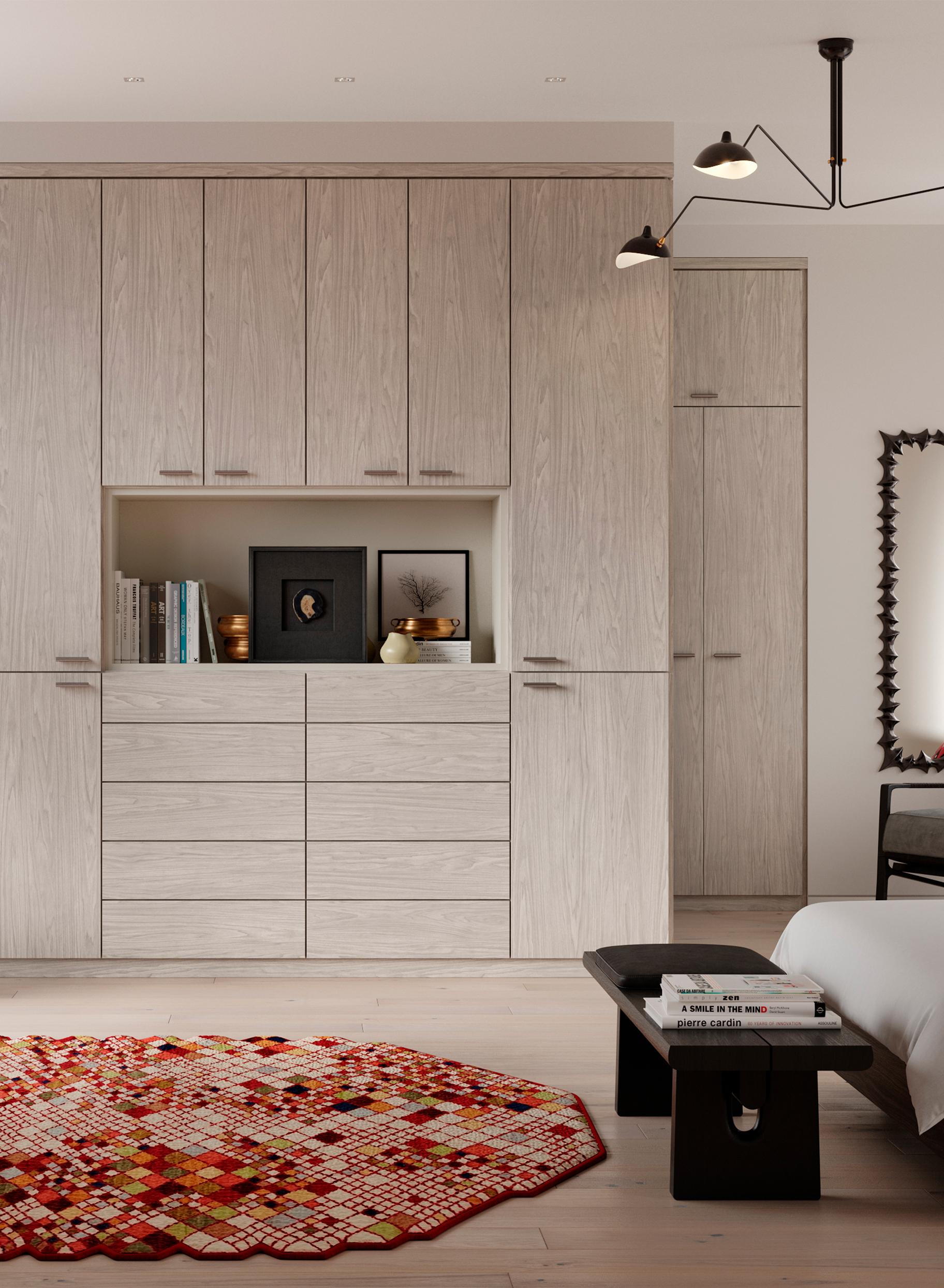 Custom built bedroom wardrobe in a grigio wood grain finish by California Closets