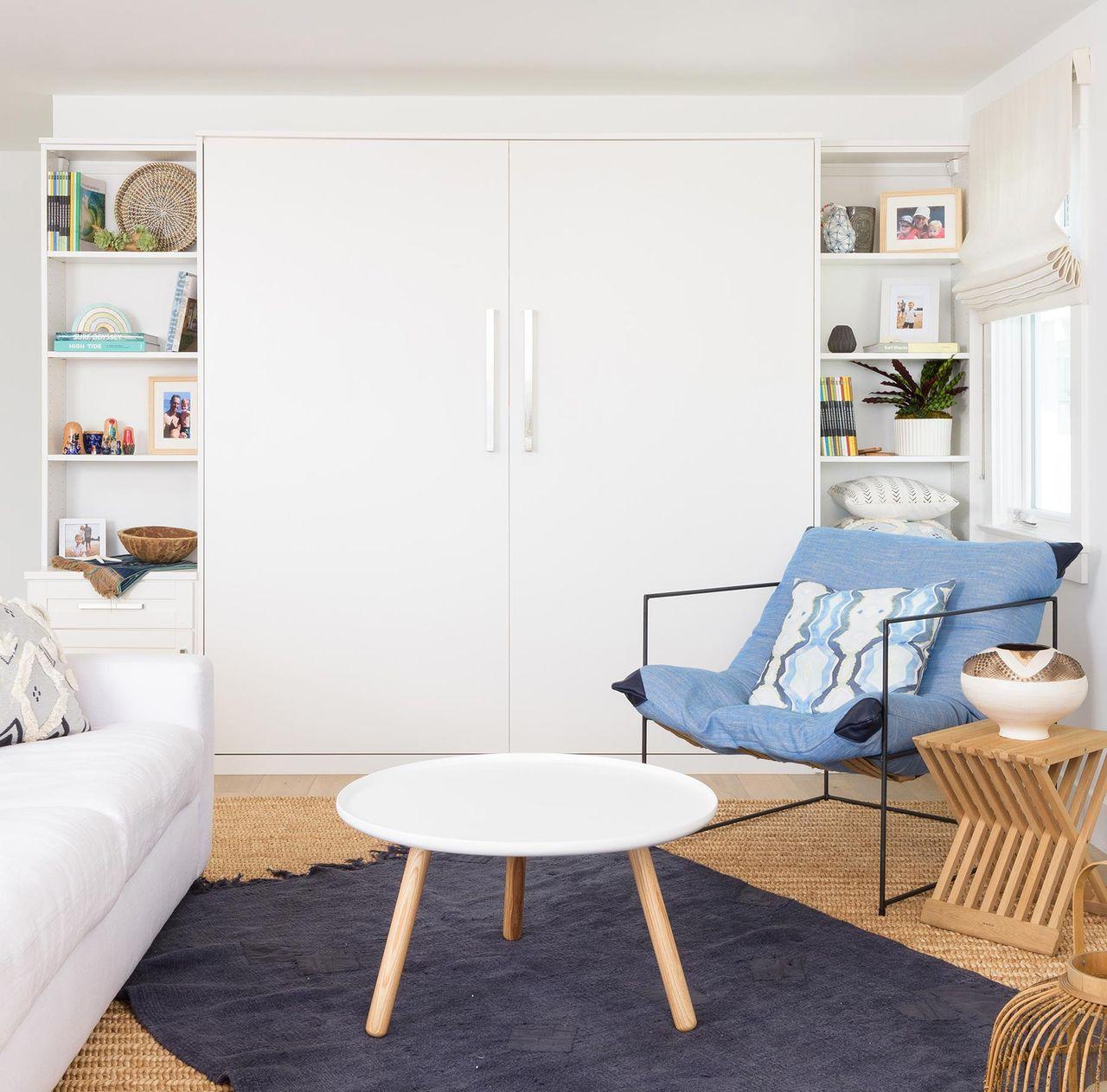 Nautical themed bedroom with Murphy bed with Shaker doors in white matte finish by California Closets