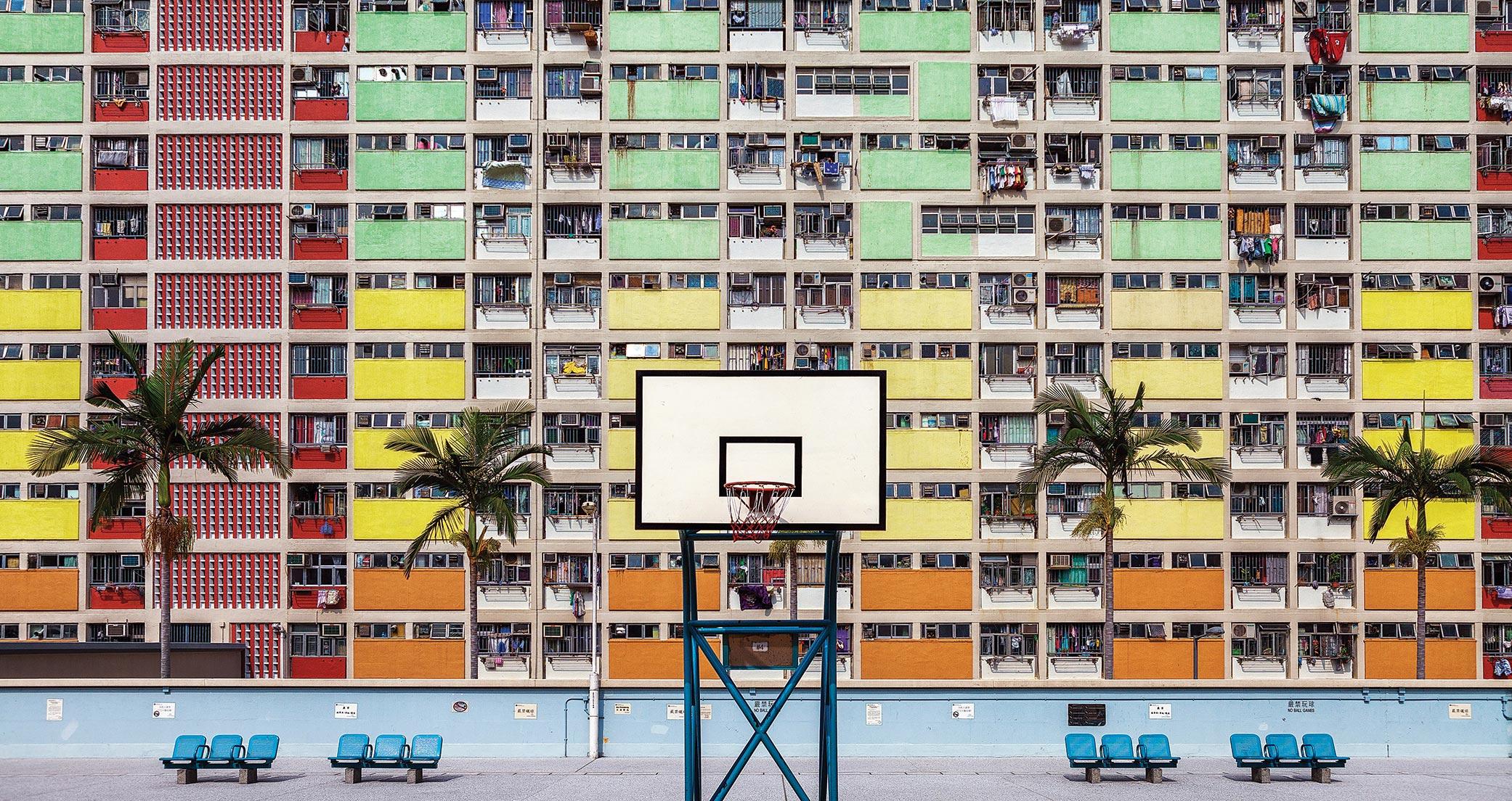 View of a brightly colored urban apartment building in Ideas of Order Magazine 