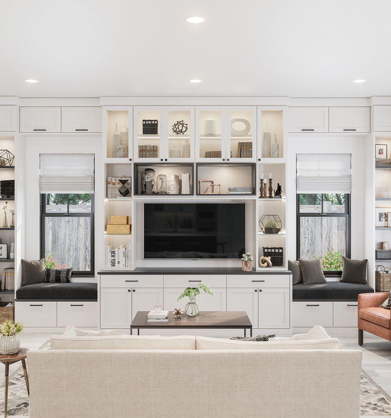 Centro de entretenimiento empotrado con gabinetes, estantes y cajones para almacenamiento en acabado de madera blanca de California Closets