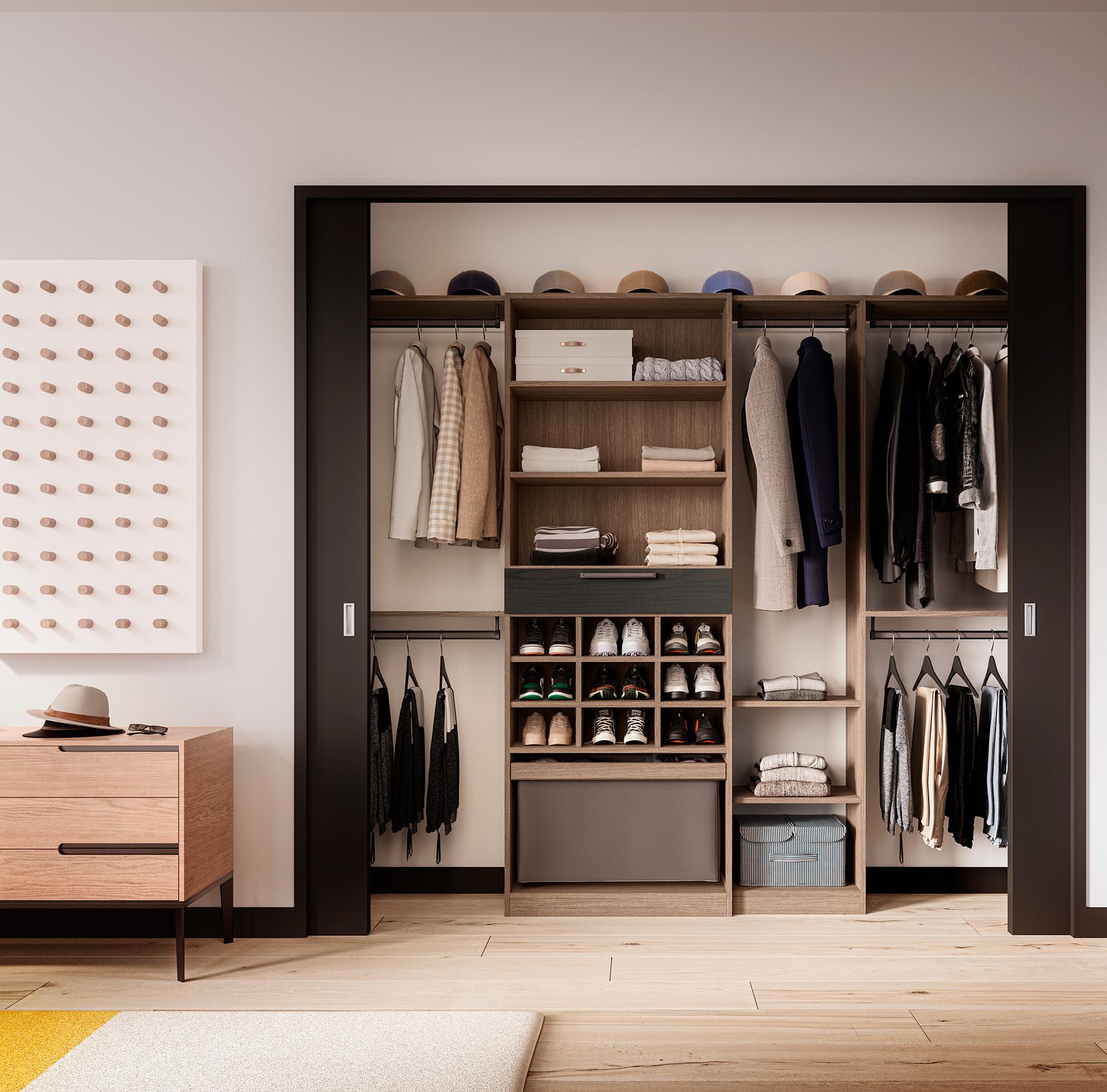 Custom reach in closet with open shelves, shoe racks and hamper designed in dark wood finish by California Closet
