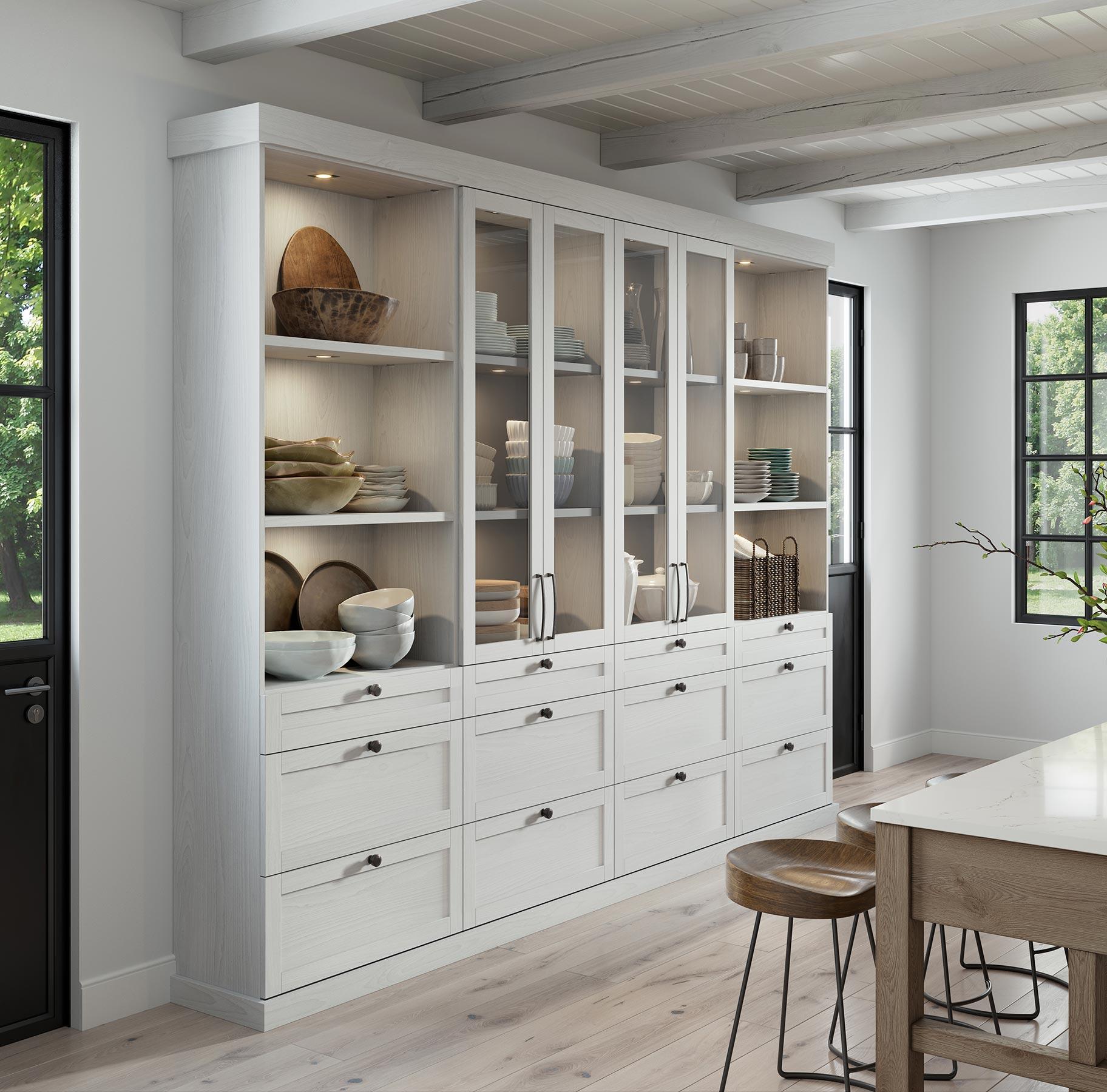 Functional kitchen pantry with pull-out drawers and custom shelving units California Closets