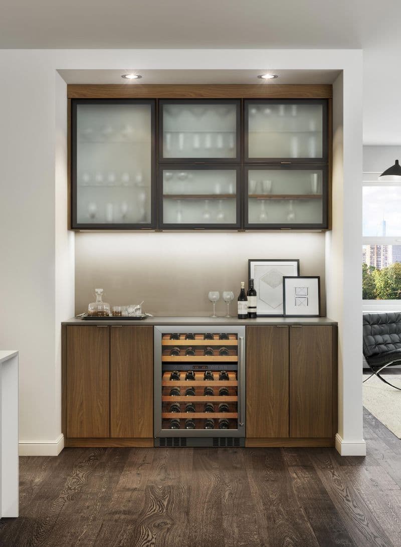 Home bar storage with wine storage and glassware shelves from California Closets