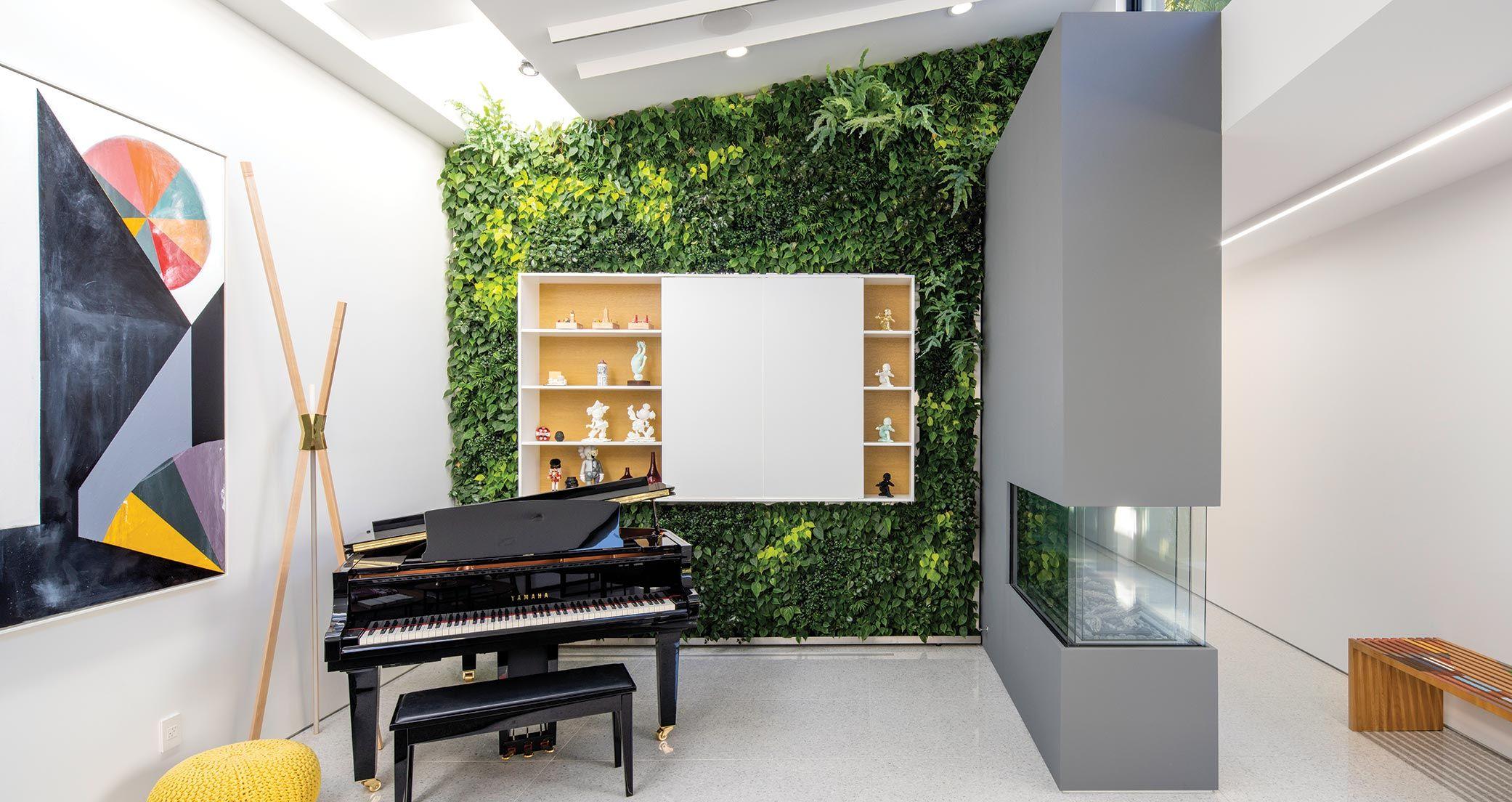 Dan Brunn's piano in a room with a wall made of 