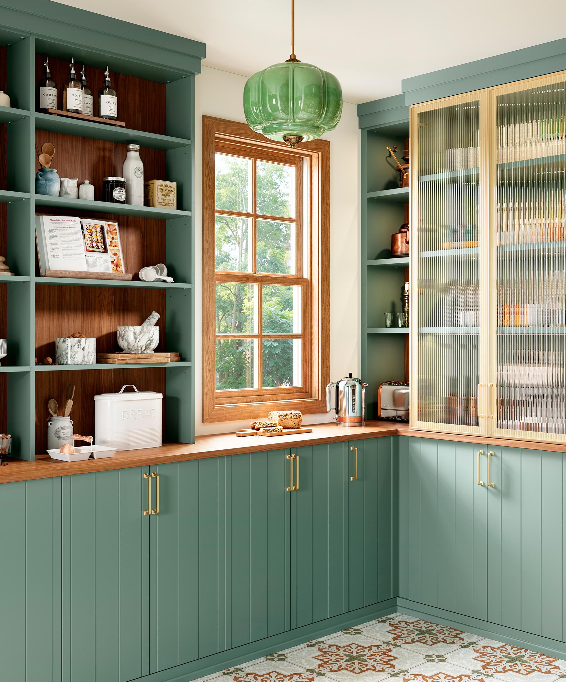 Kitchen pantry designed with vertical glass doors and green finish by California Closets