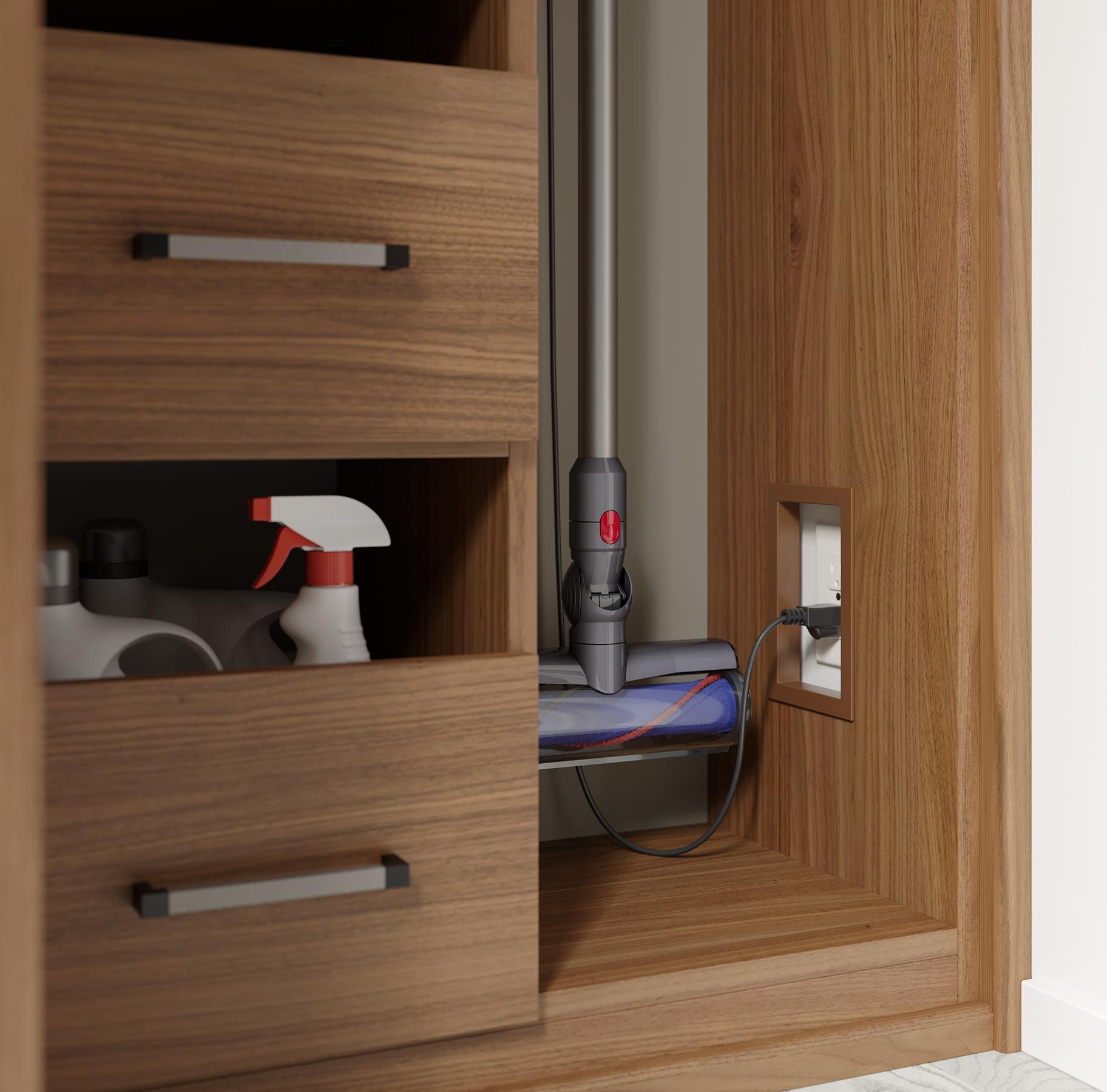 Closet closeup of open top drawers and appliance storage for the laundry room designed by California Closets