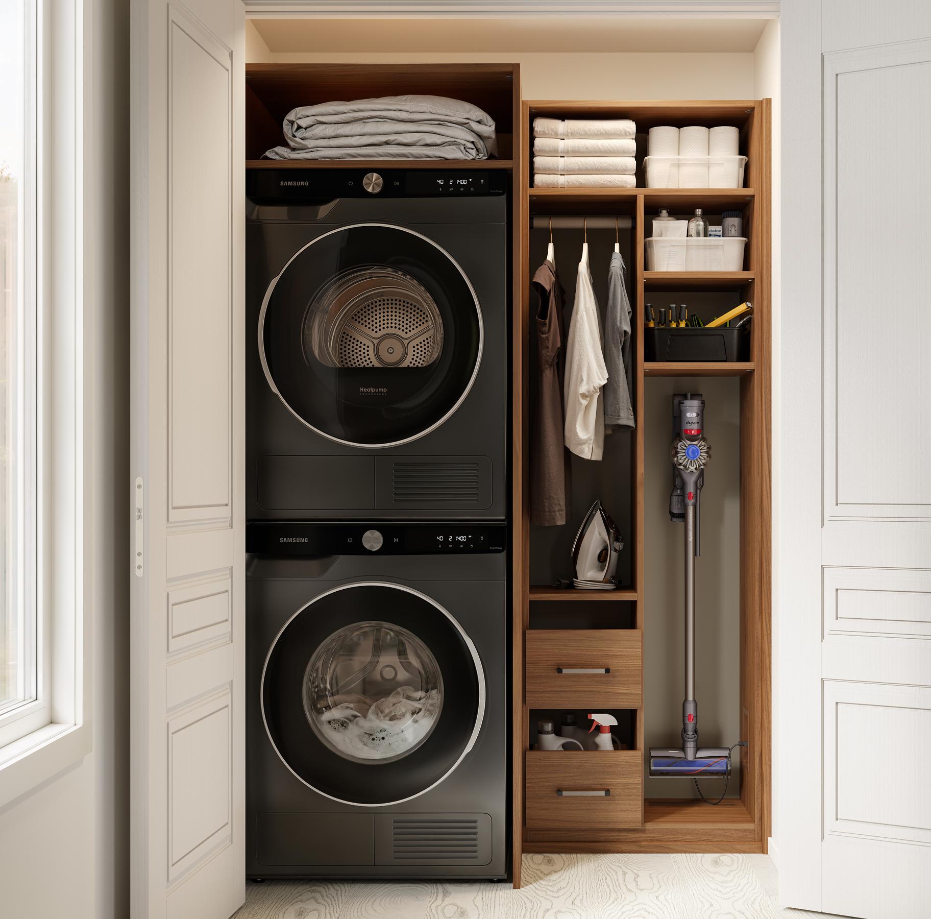 Laundry closet customized in a small space with shelving for linen and appliances by California Closets