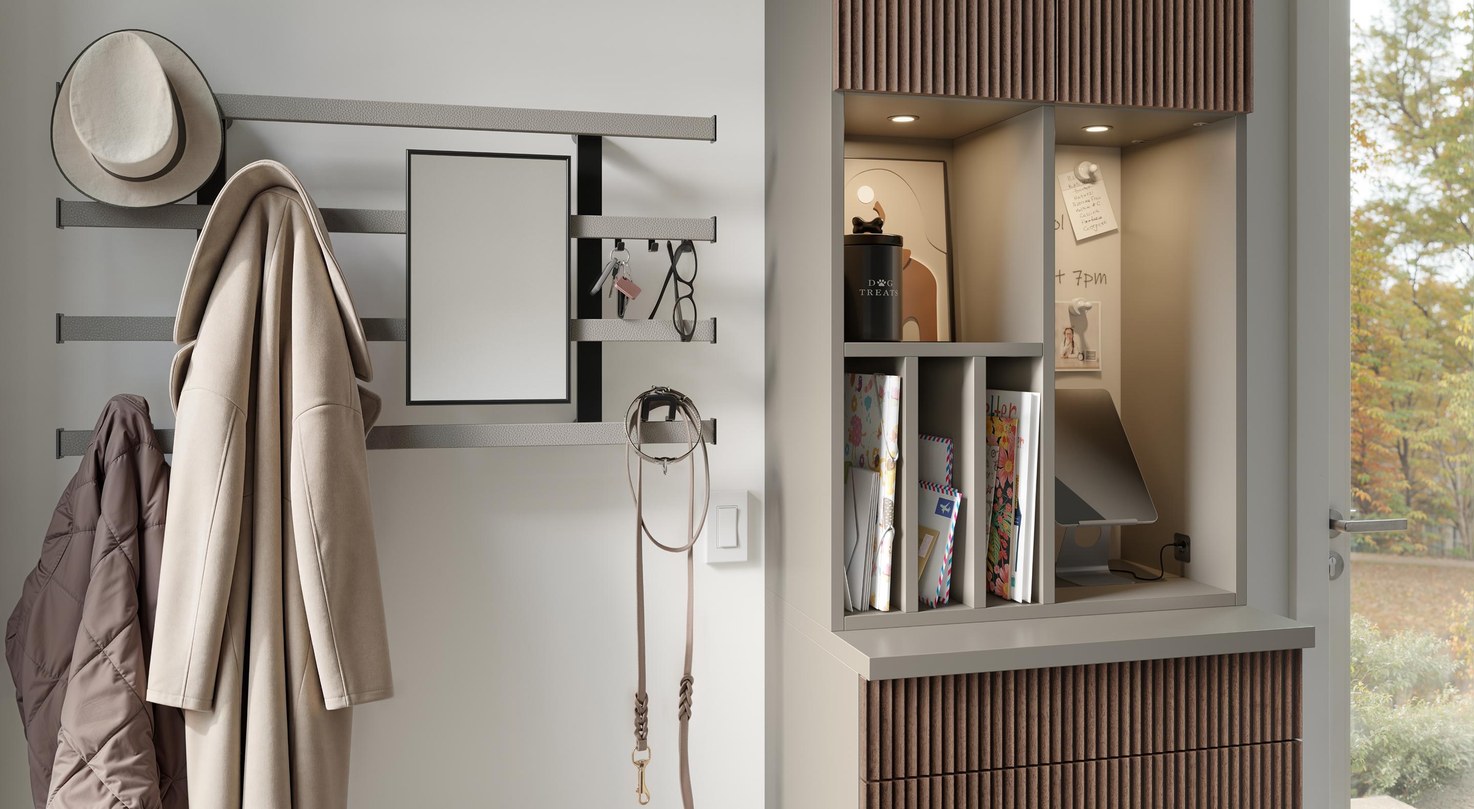 Mudroom with wall organizers, custom shelving, and LED lighting designed by California Closets