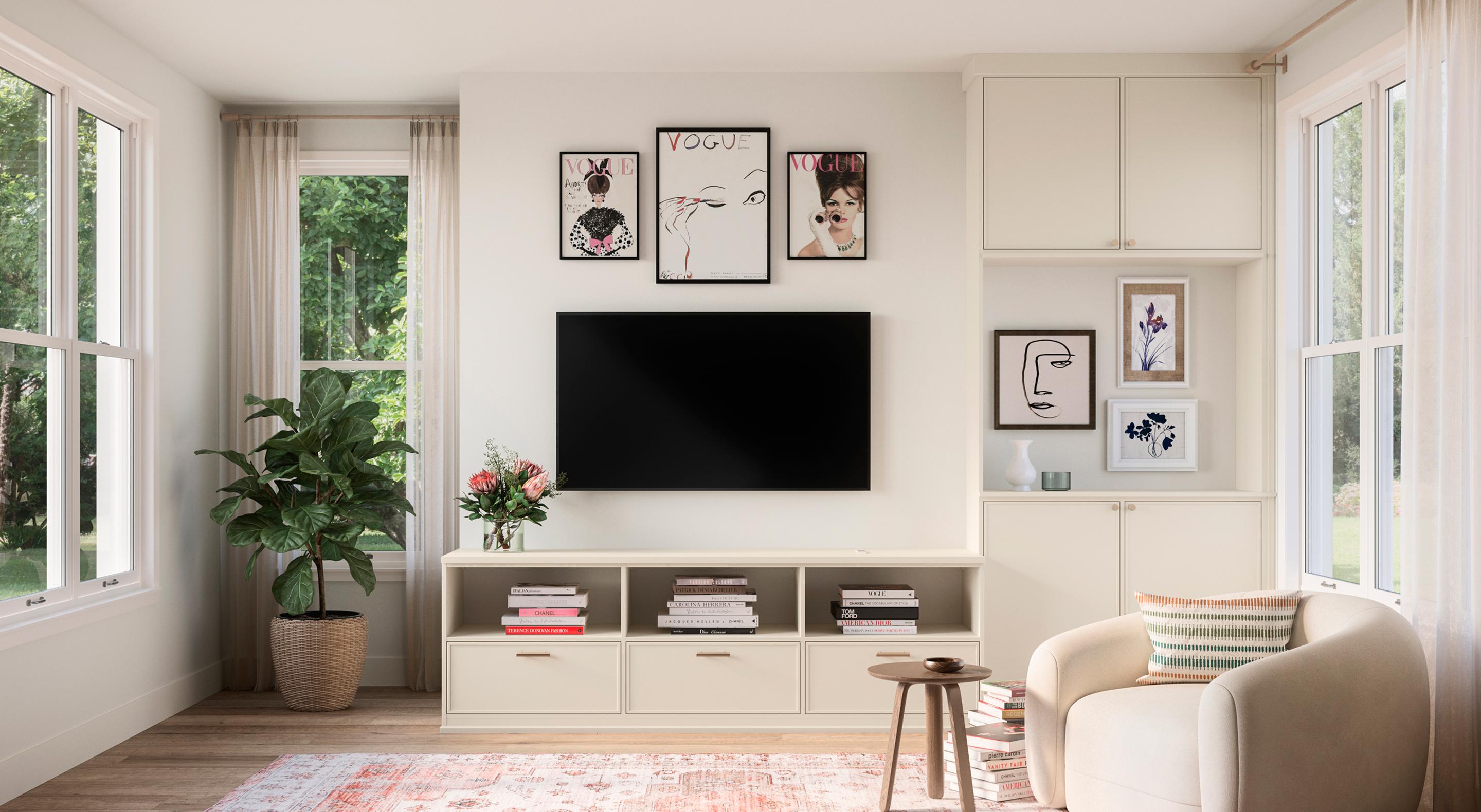 Contemporary Madison townhome featuring a custom media center with storage cabinets in matte and wood grain finishes, warm hardware accents, and a neutral, organized design by California Closets