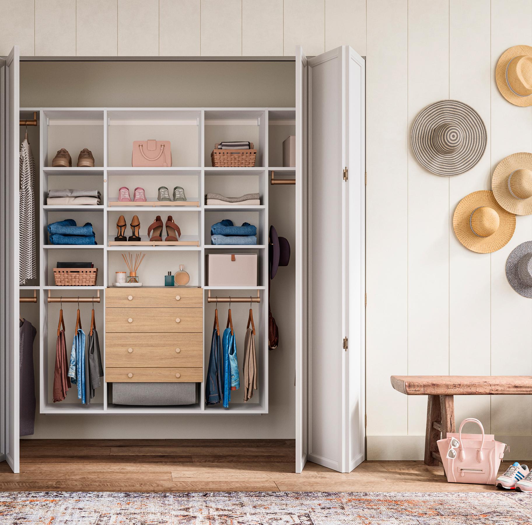 Custom reach-in closet in Dove Luxe Matte finish with double and long hanging sections, slanted shoe shelves, glass display shelf, and built-in drawers, designed to maximize space and organize clothing, shoes, and accessories by California Closets.