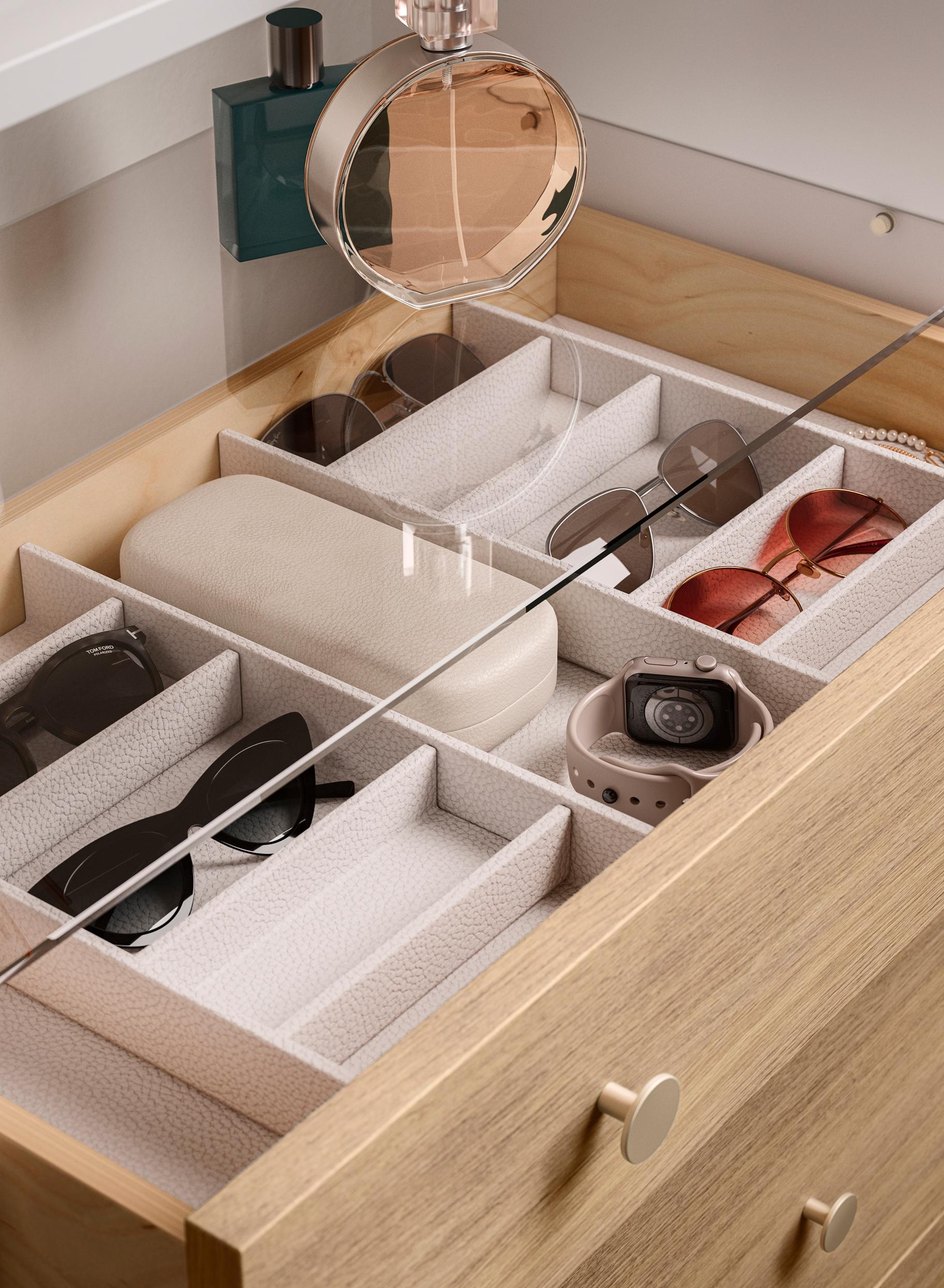 Dedicated sunglass drawer with vegan leather inserts in multiple finishes, designed for flexible eyewear and accessory storage that seamlessly integrates into a modern closet system by California Closets.